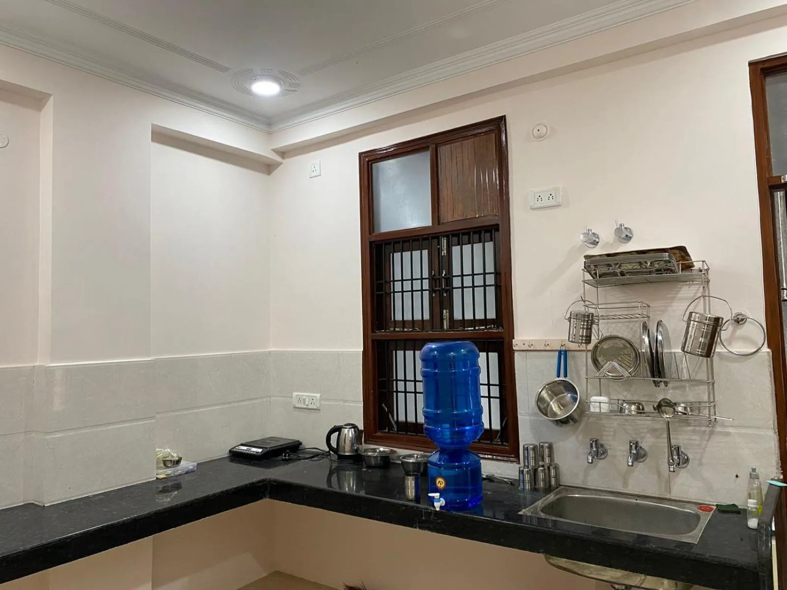 kitchen in Shri Ram Paying Guest House Premium Rooms