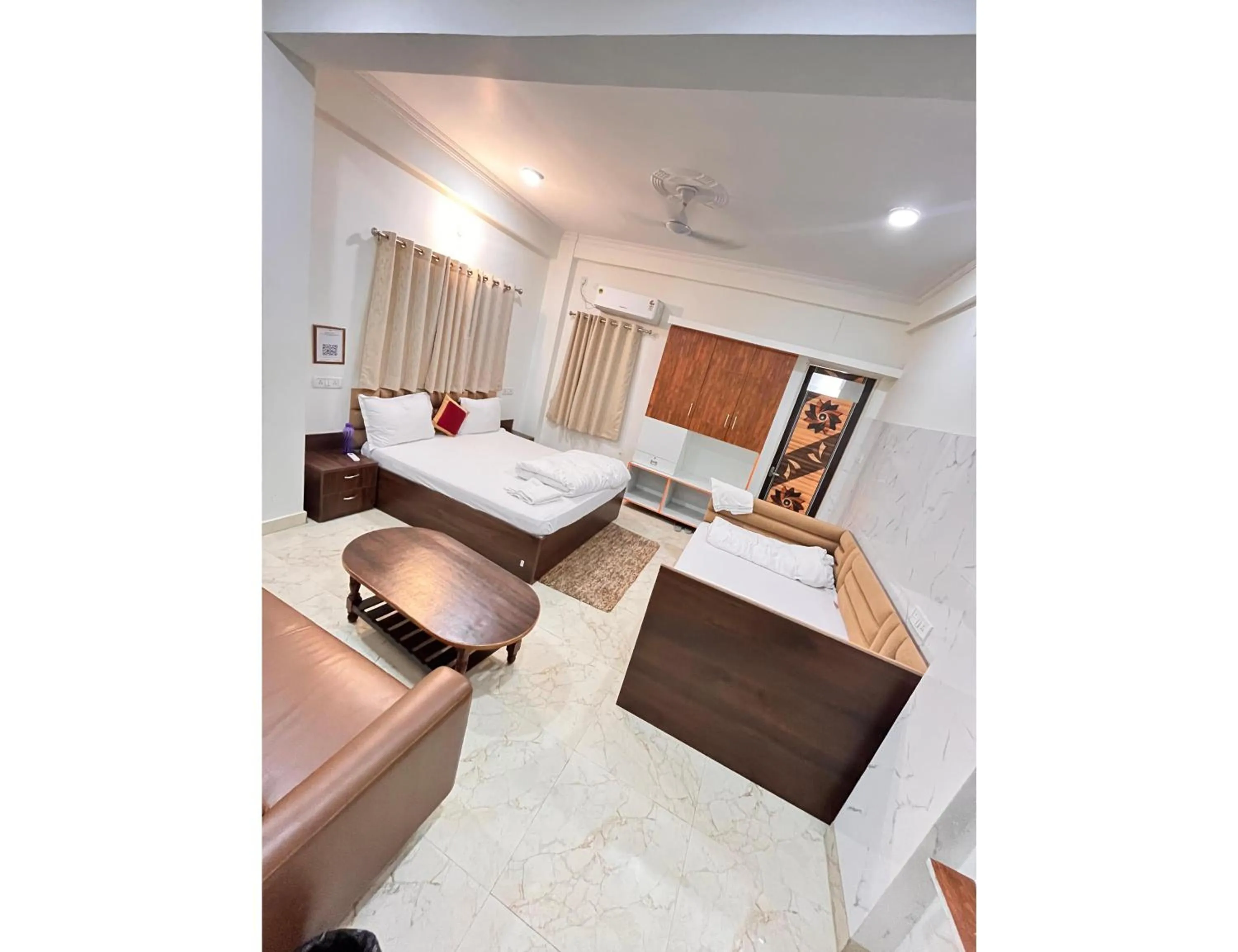 Bed in Shri Ram Paying Guest House Premium Rooms