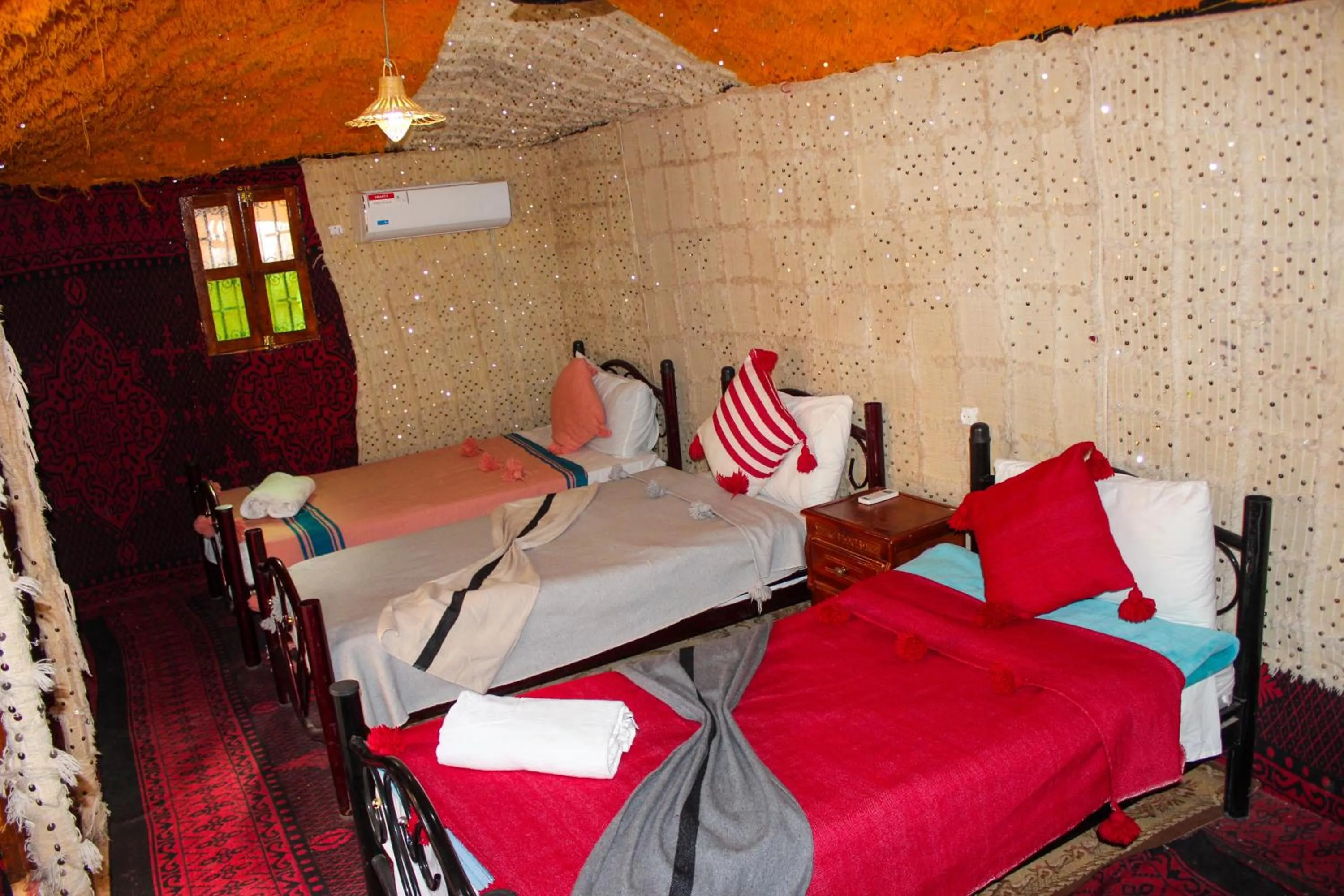 Bed in Riad Soleil du Monde