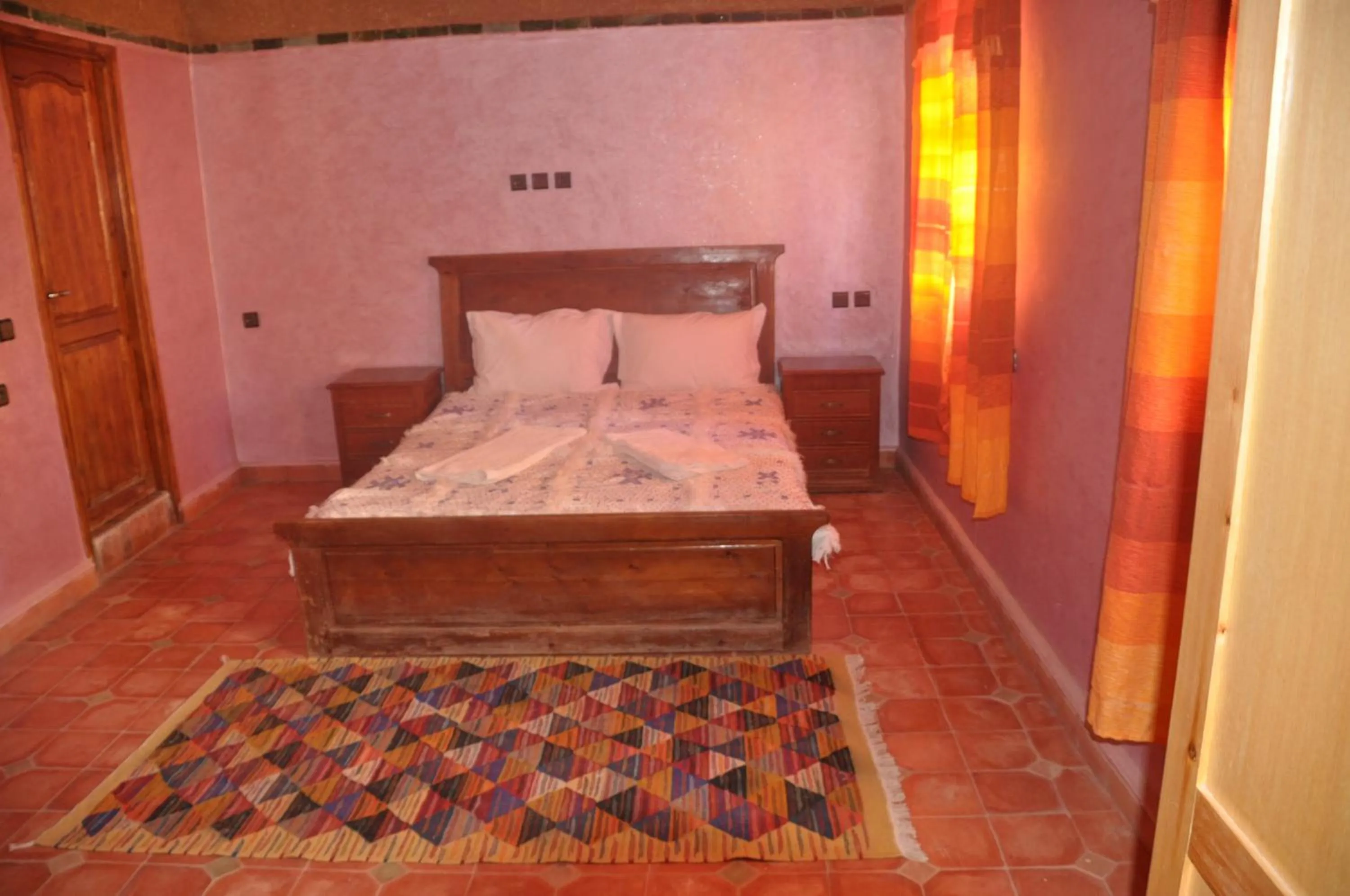 Bed in Riad Soleil du Monde