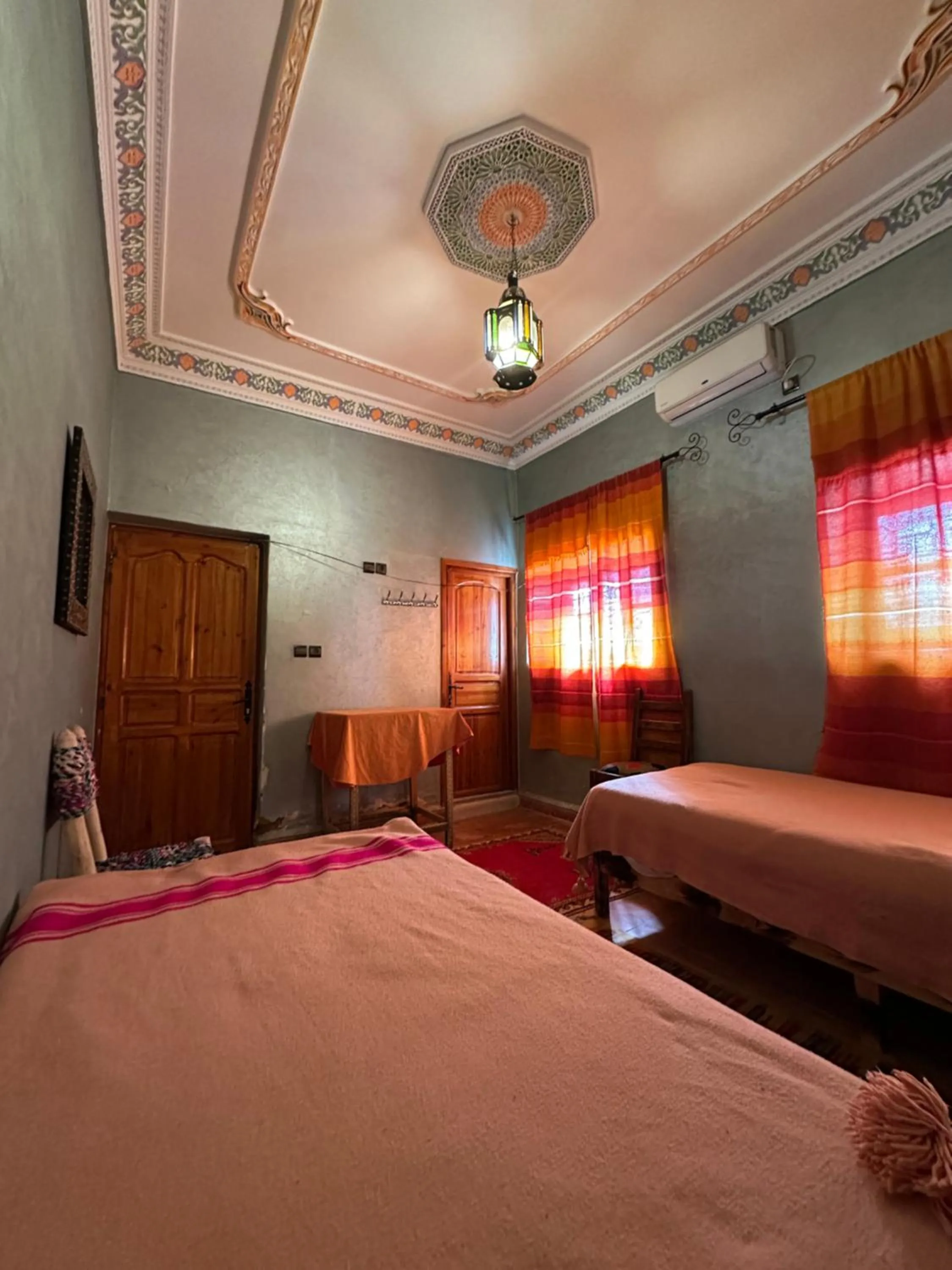 Bed in Riad Soleil du Monde