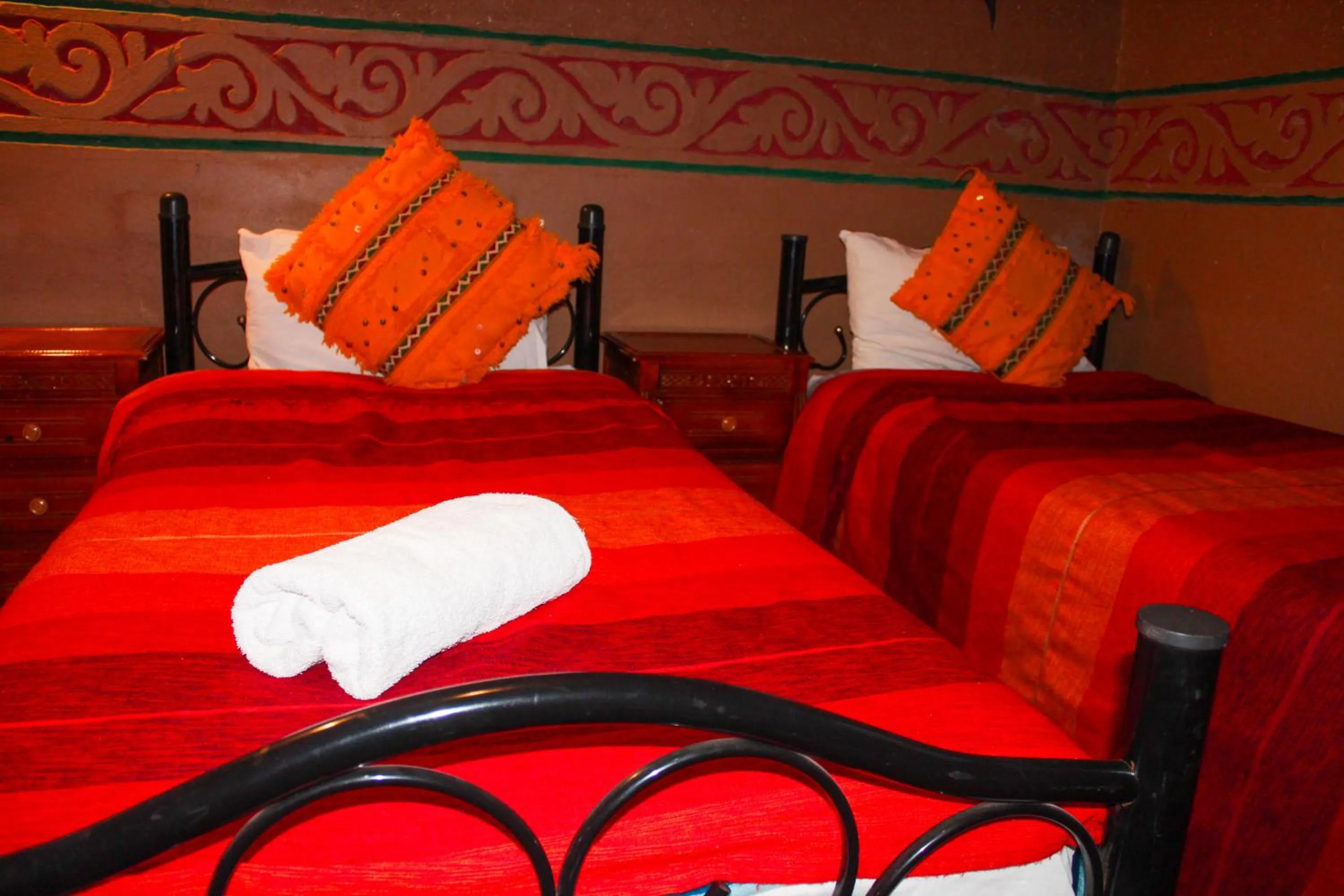 Bed in Riad Soleil du Monde