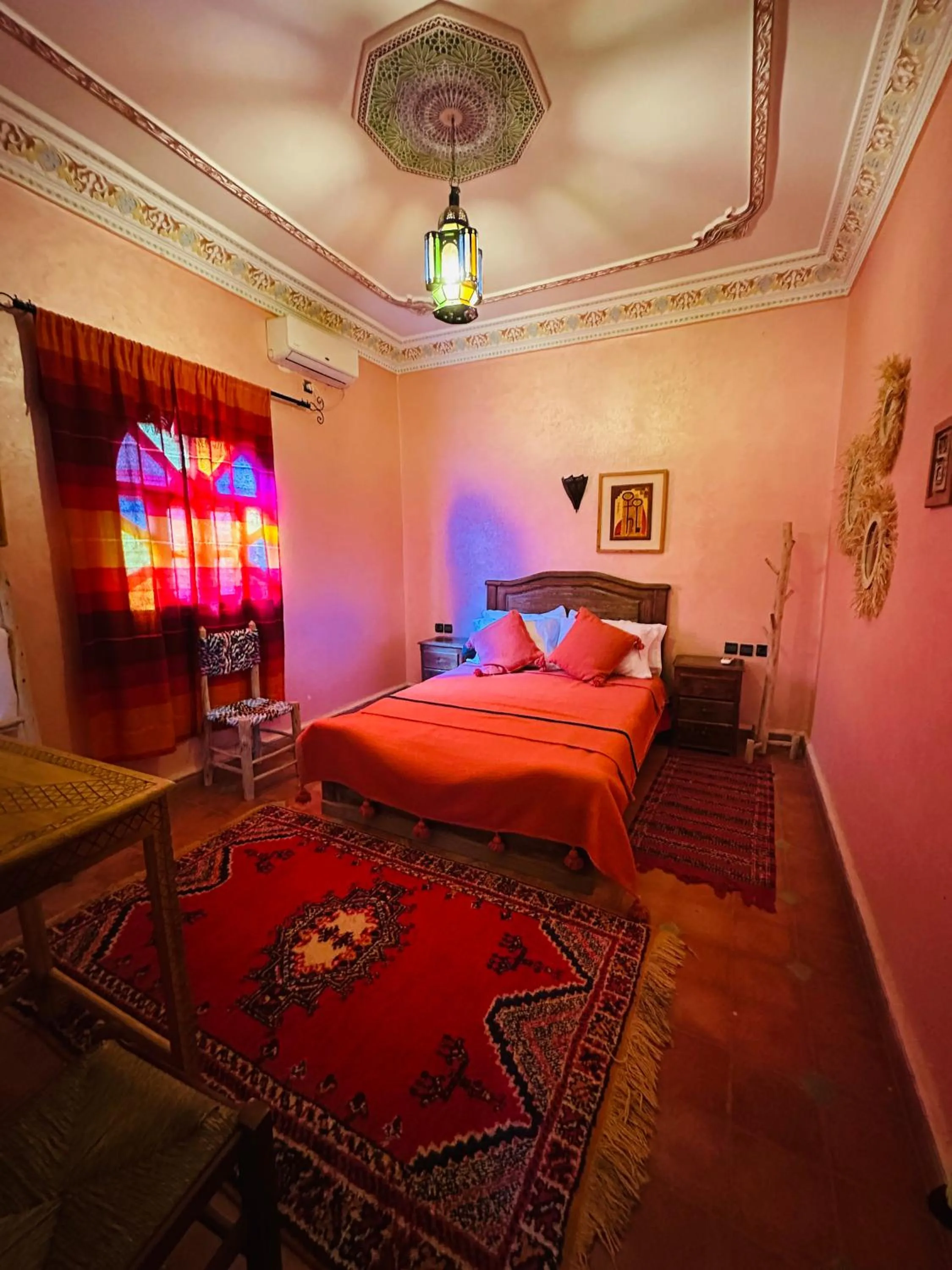 Bed in Riad Soleil du Monde