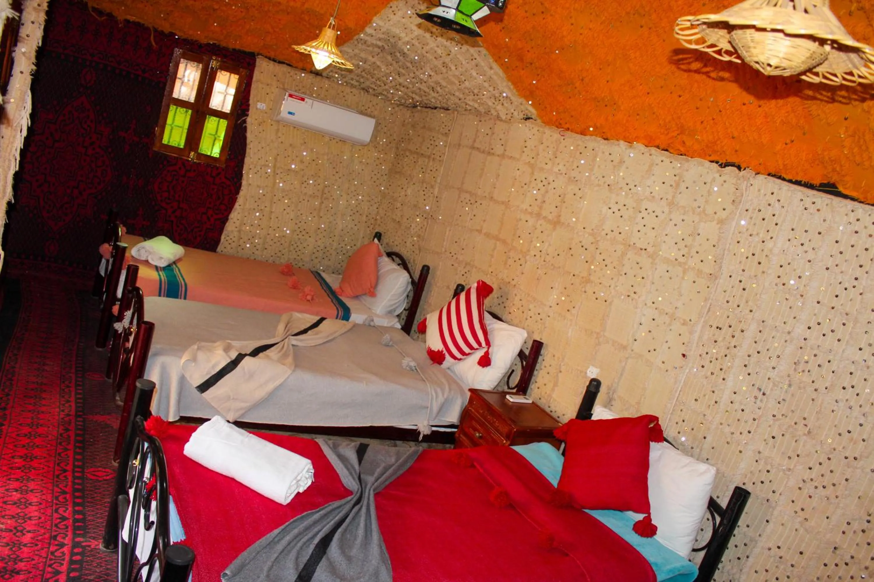 Bed in Riad Soleil du Monde