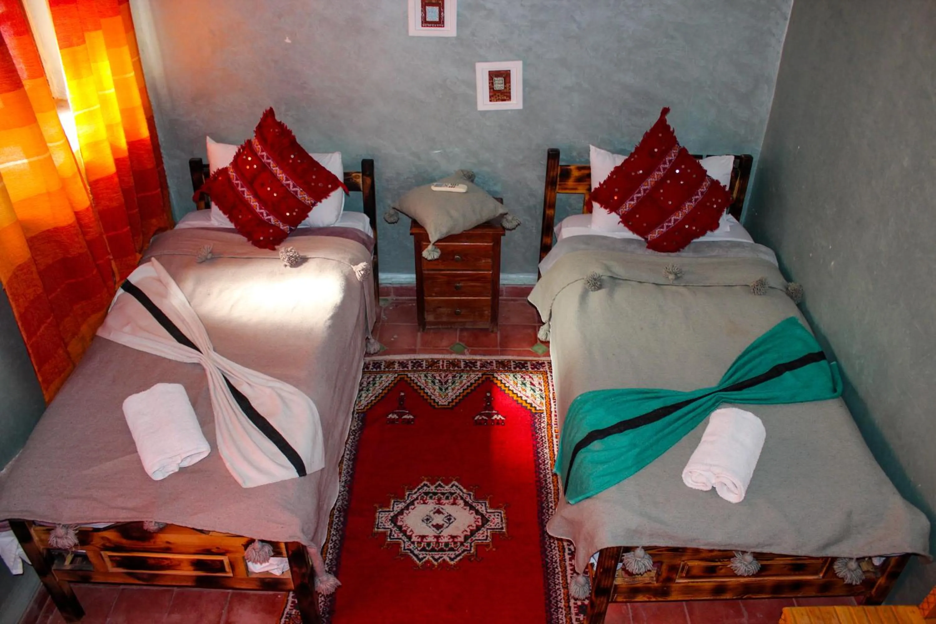 Bed in Riad Soleil du Monde