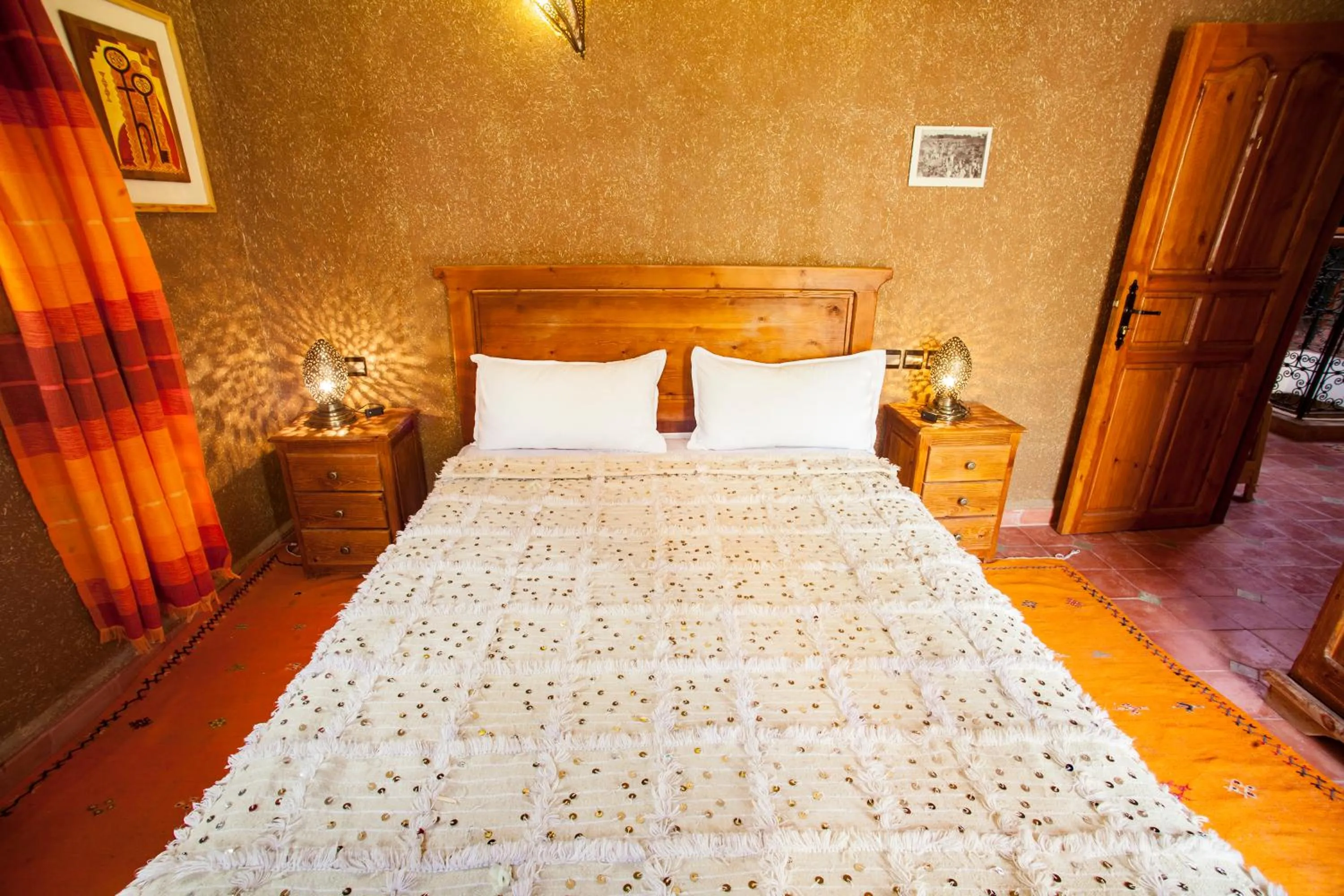 Bed in Riad Soleil du Monde