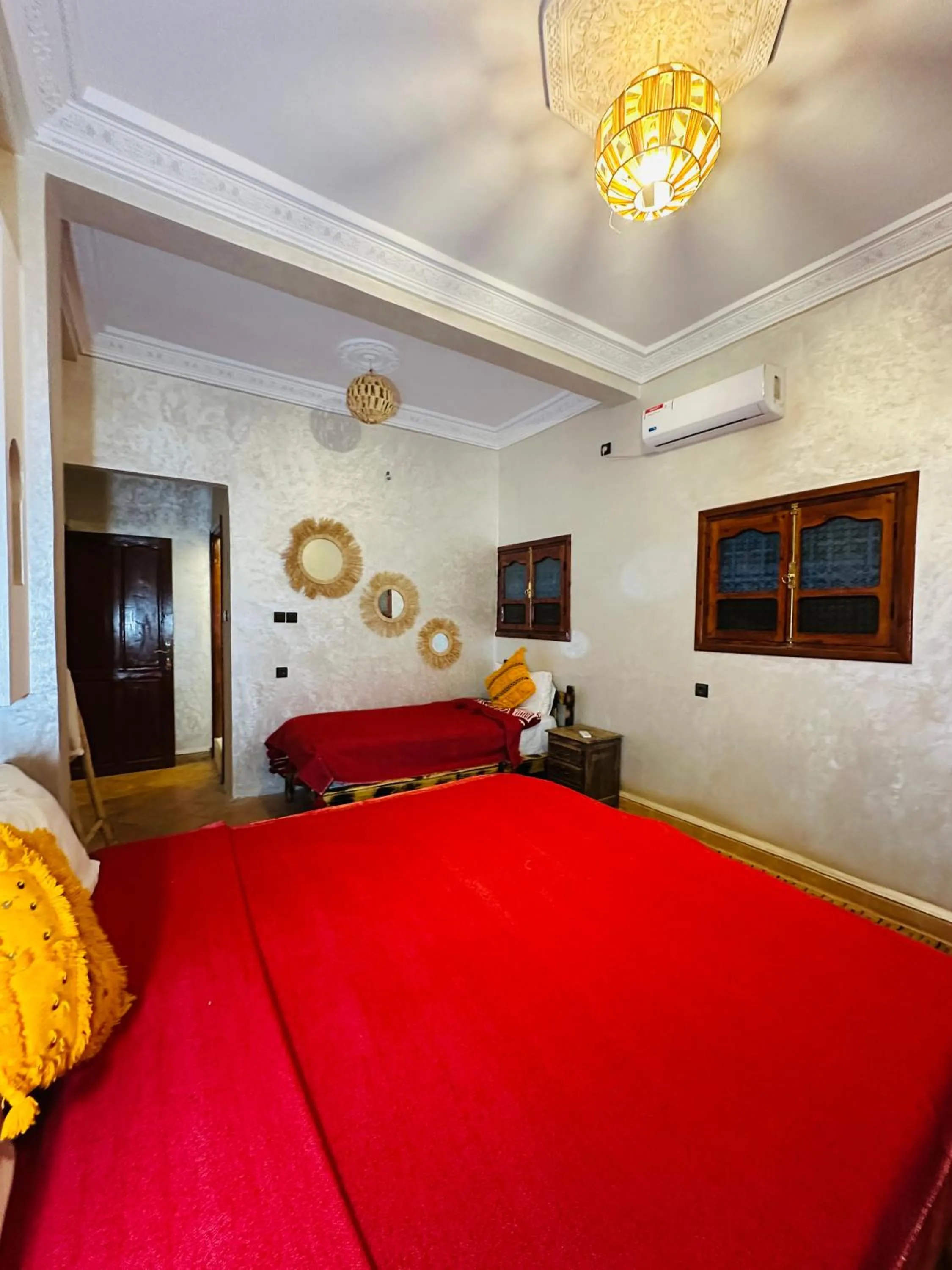 Bed in Riad Soleil du Monde