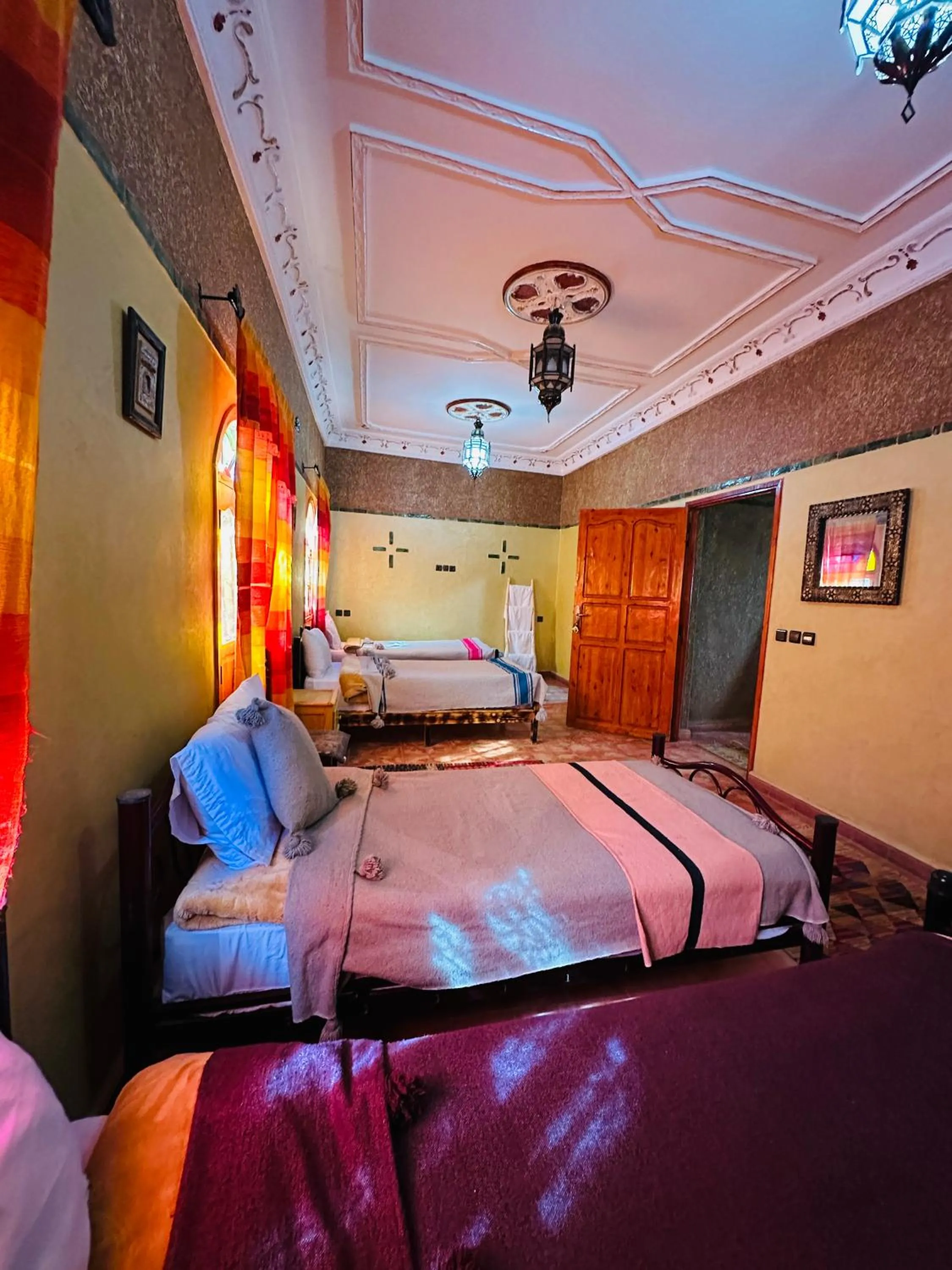 Bed in Riad Soleil du Monde