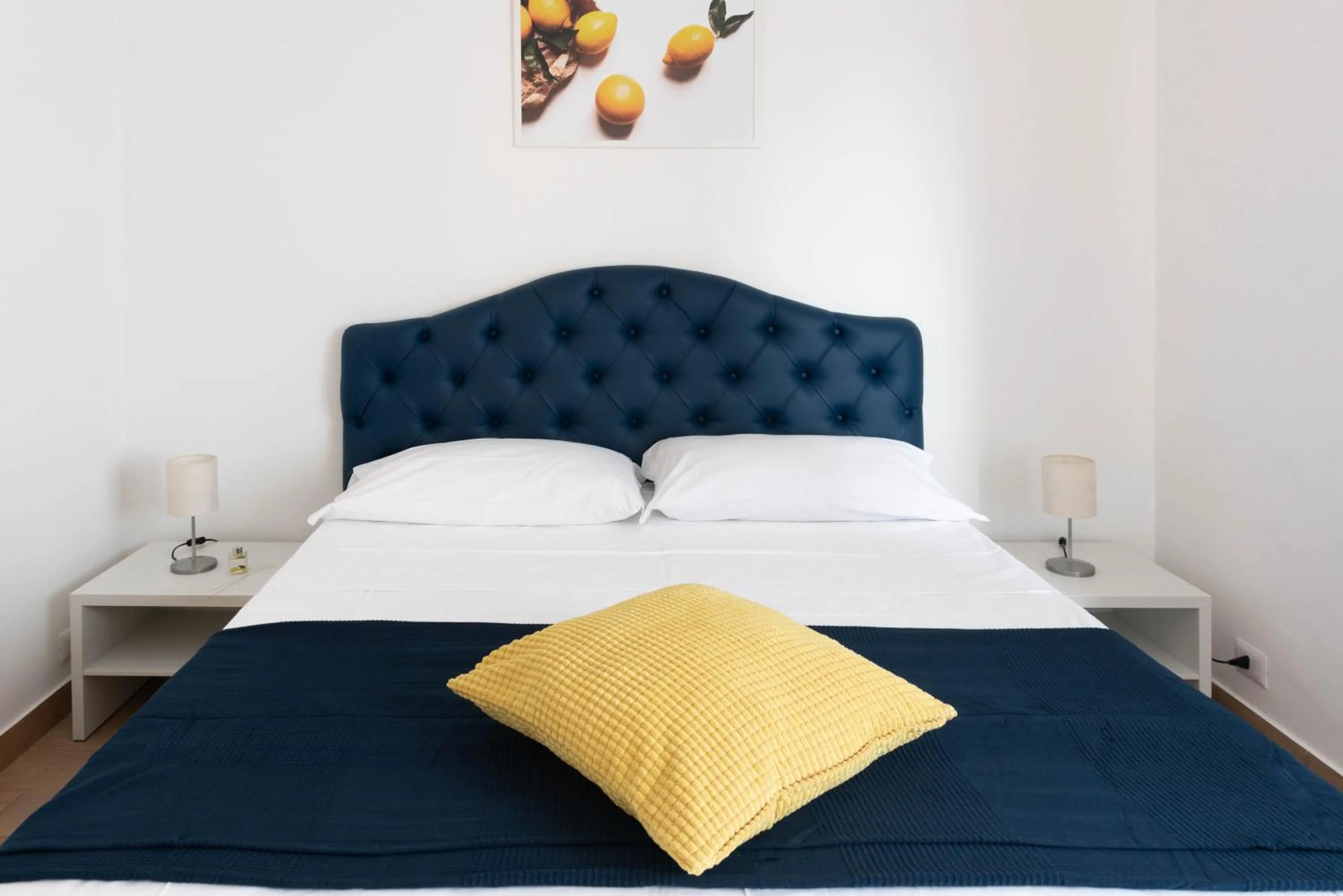 Bed in Sirentum Rooms