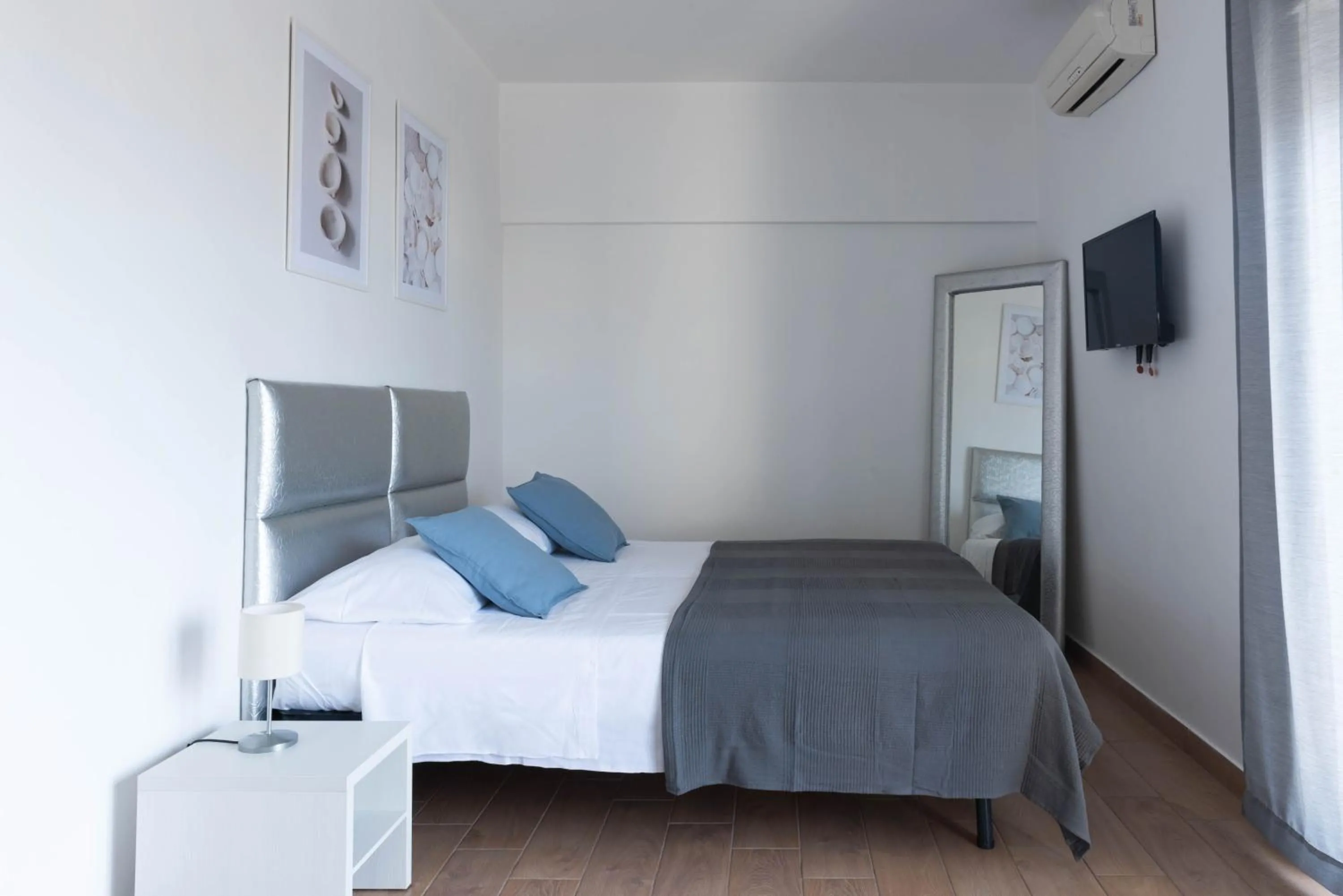 Bed in Sirentum Rooms