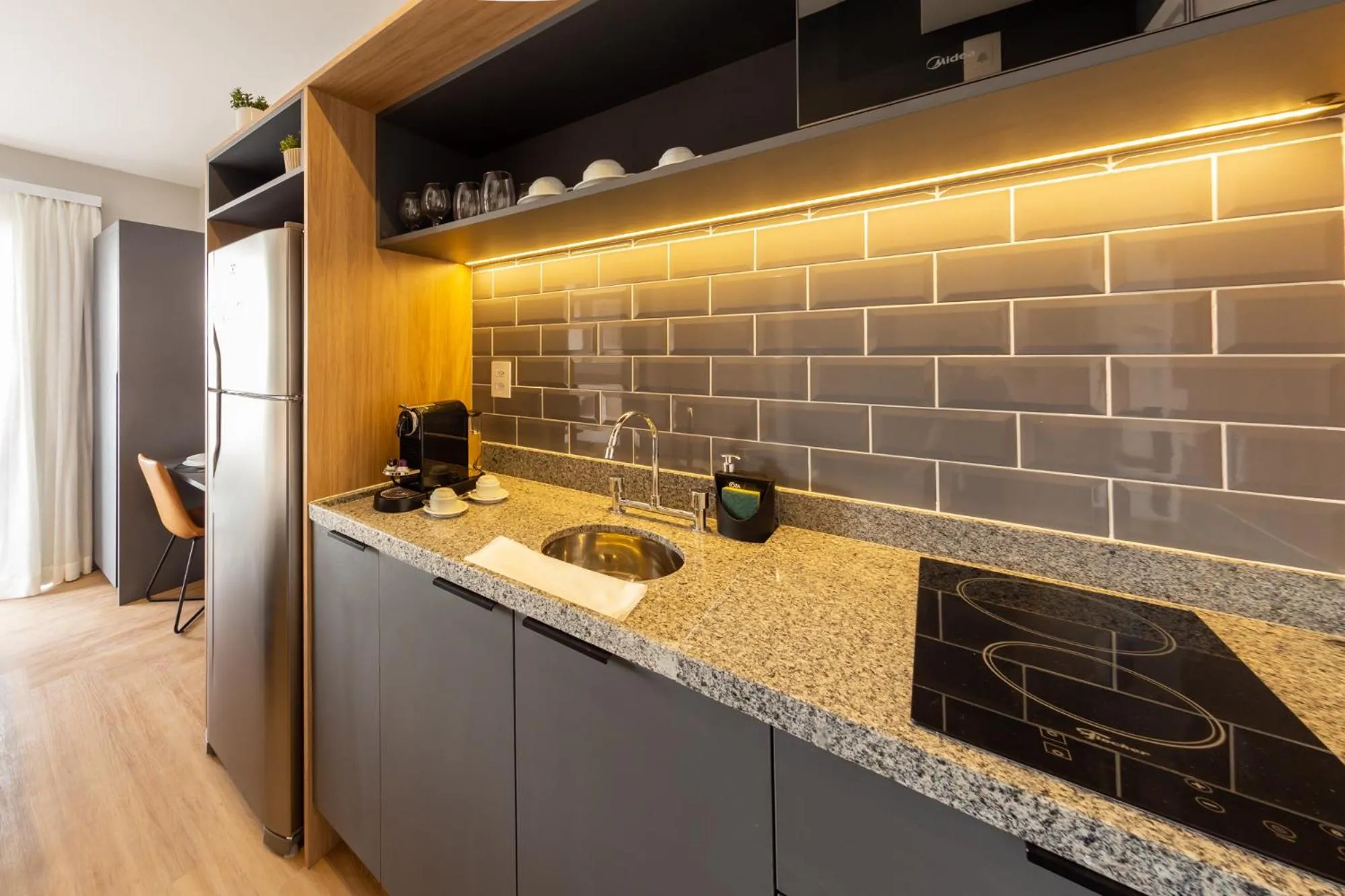 Kitchen or kitchenette in Charlie Nik Vila Mariana