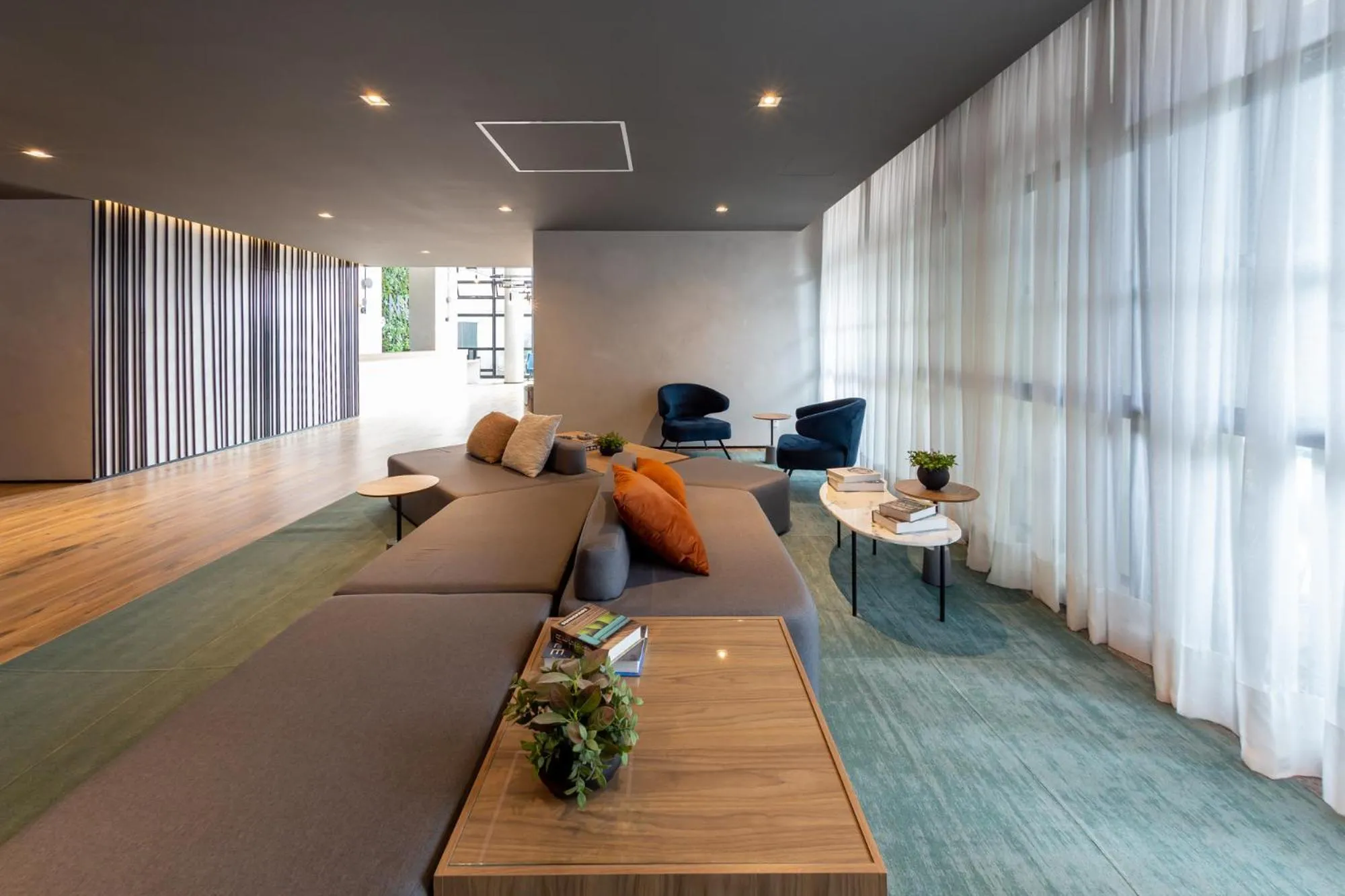 Seating area in Charlie Nik Vila Mariana