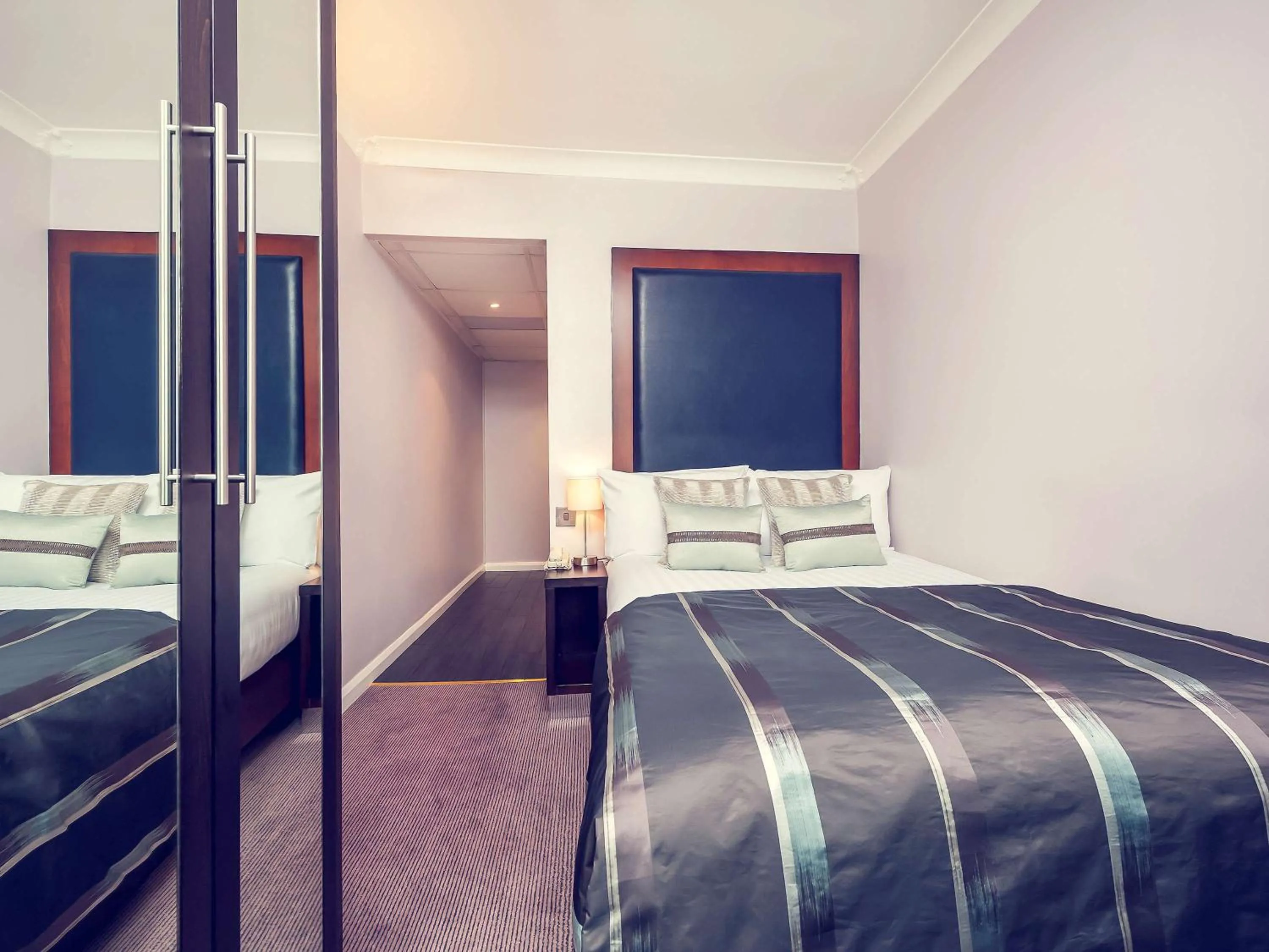 Photo of the whole room in Mercure London Kensington Hotel