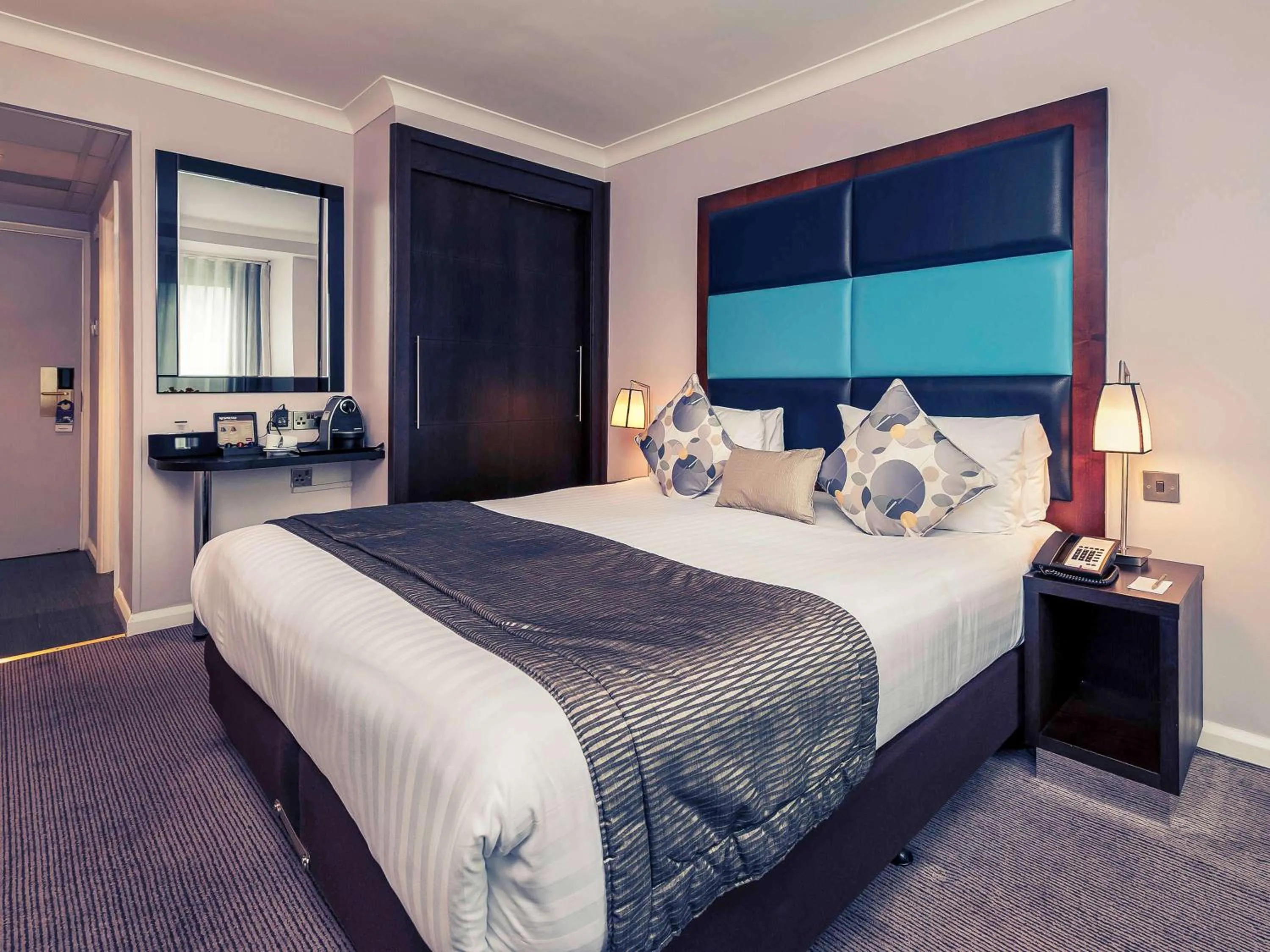 Photo of the whole room in Mercure London Kensington Hotel