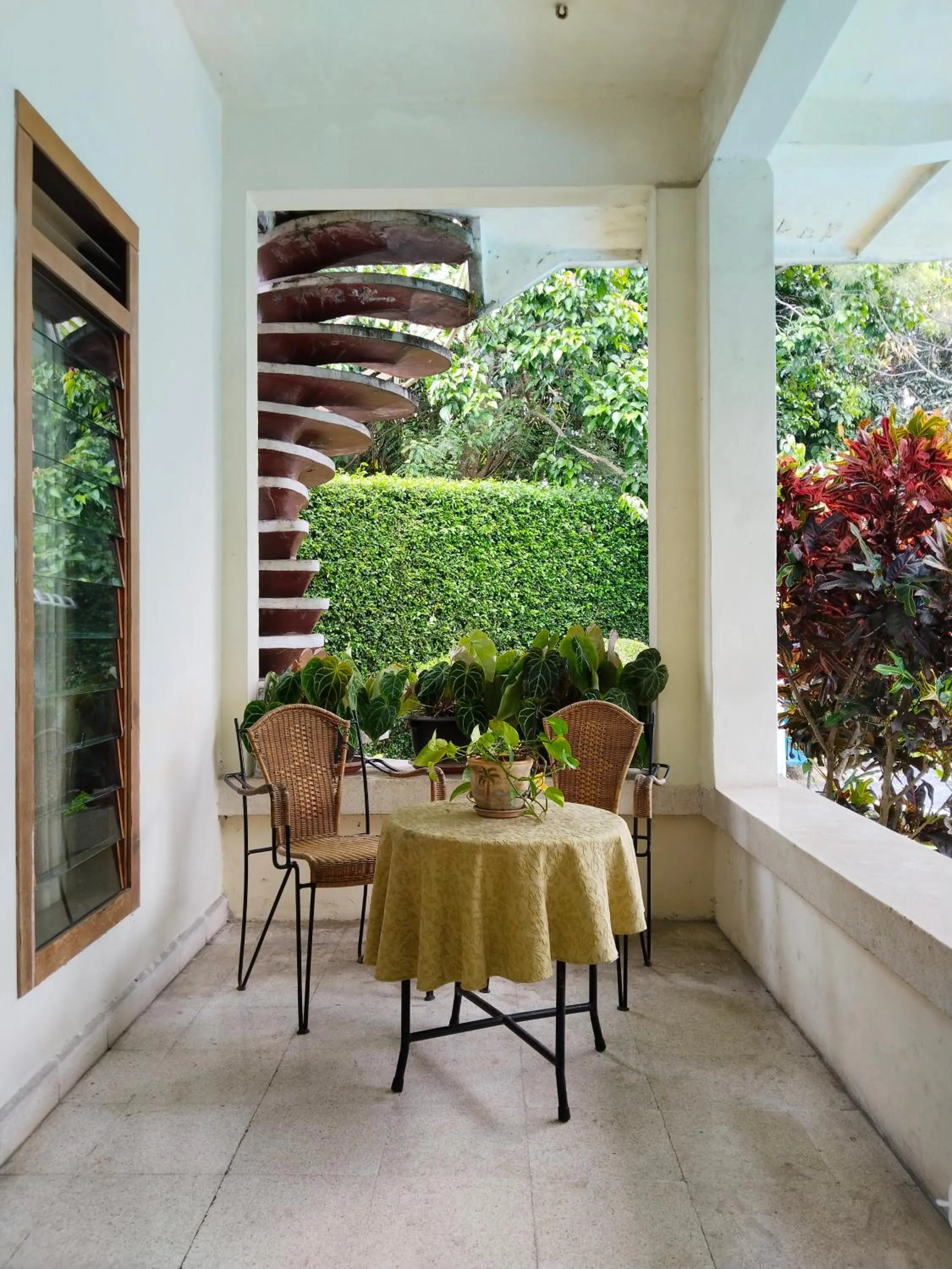 Seating area in The Garden Family Guest House powered by Cocotel