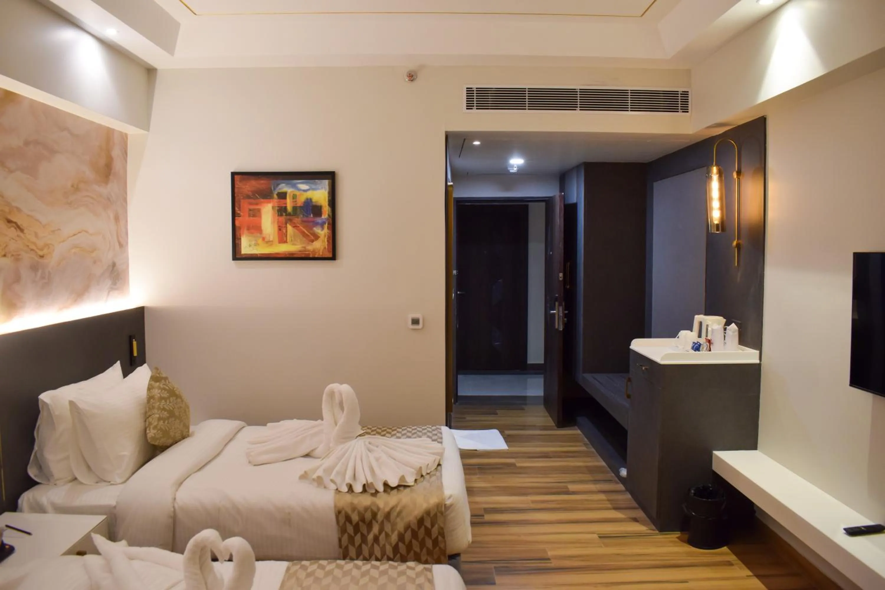 Photo of the whole room, Bed in Tulip Inn Shravasti