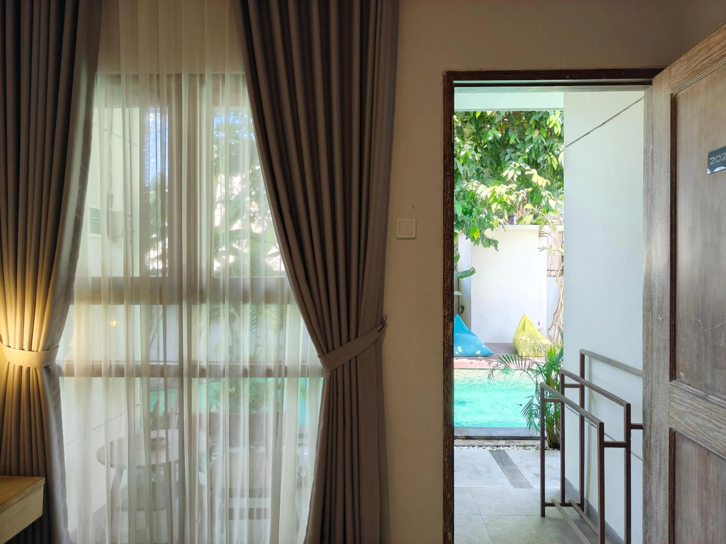 View (from property/room), Bed in Manuver Surf And Stay Uluwatu Bali