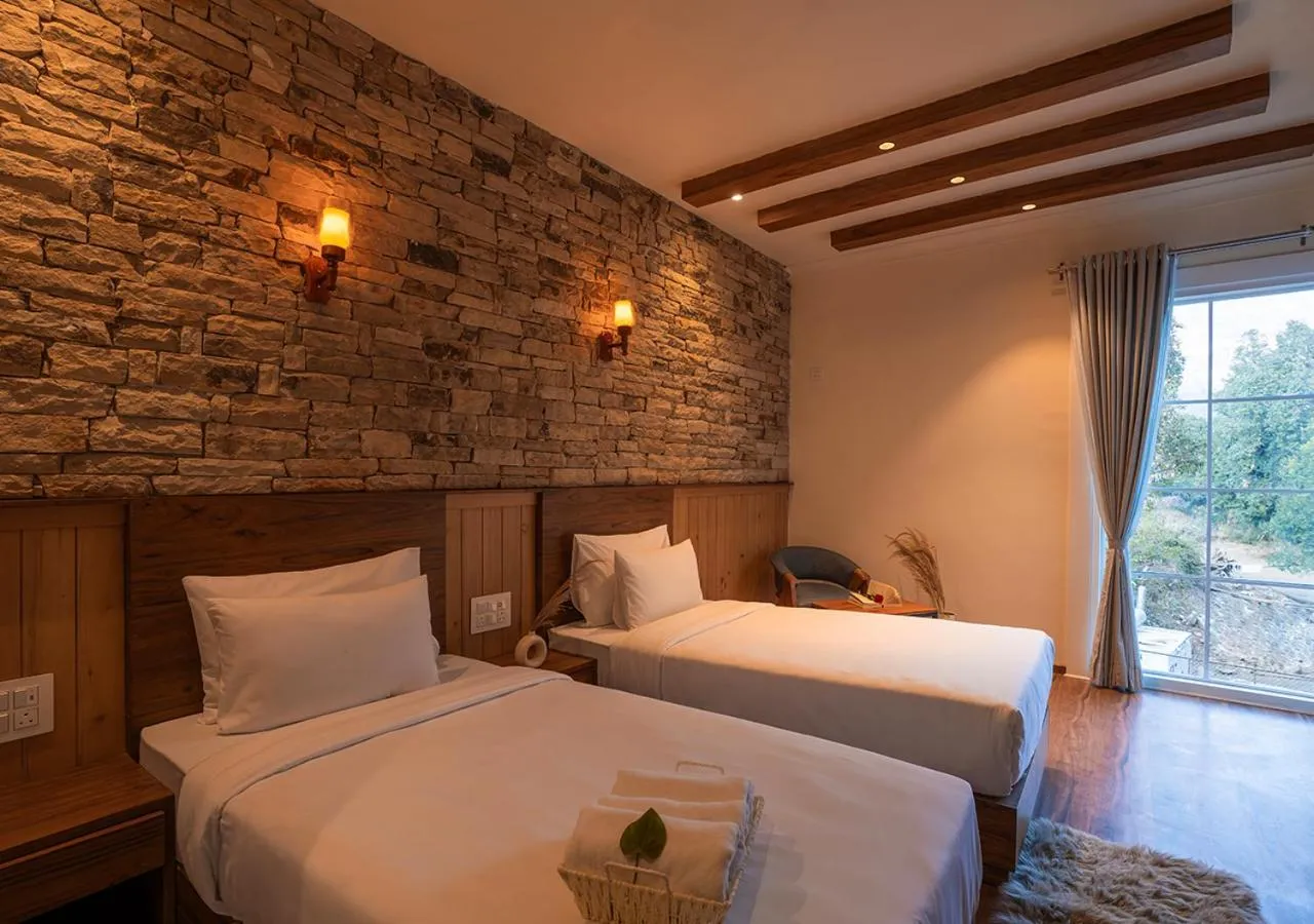 Bed in Moustache Bhimtal Luxuria, Nainital