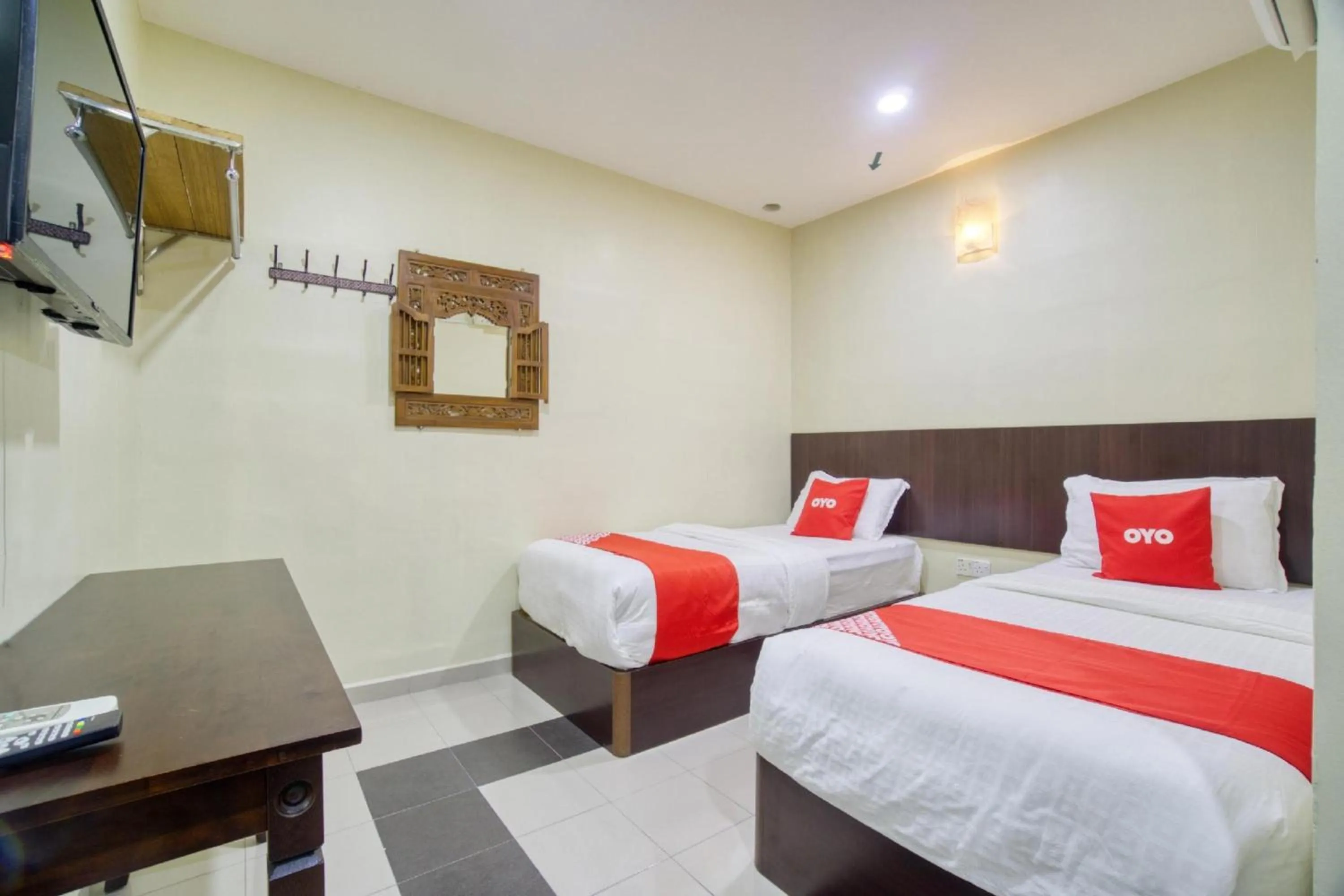 TV and multimedia, Bed in OYO 89960 Manjung Inn Hotel