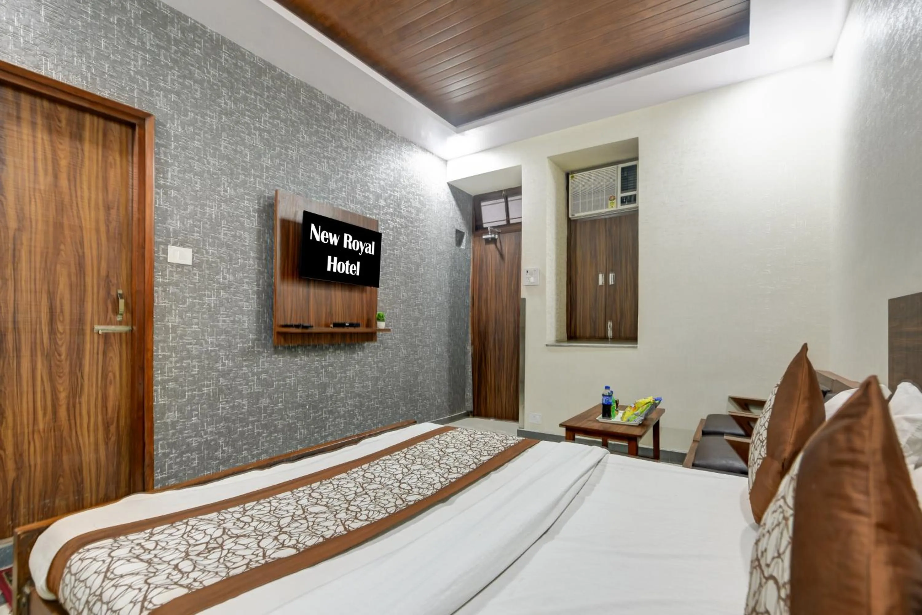 Photo of the whole room, Bed in New Royal Hotel Just Near Old Delhi Railway Station And Chandni Chowk