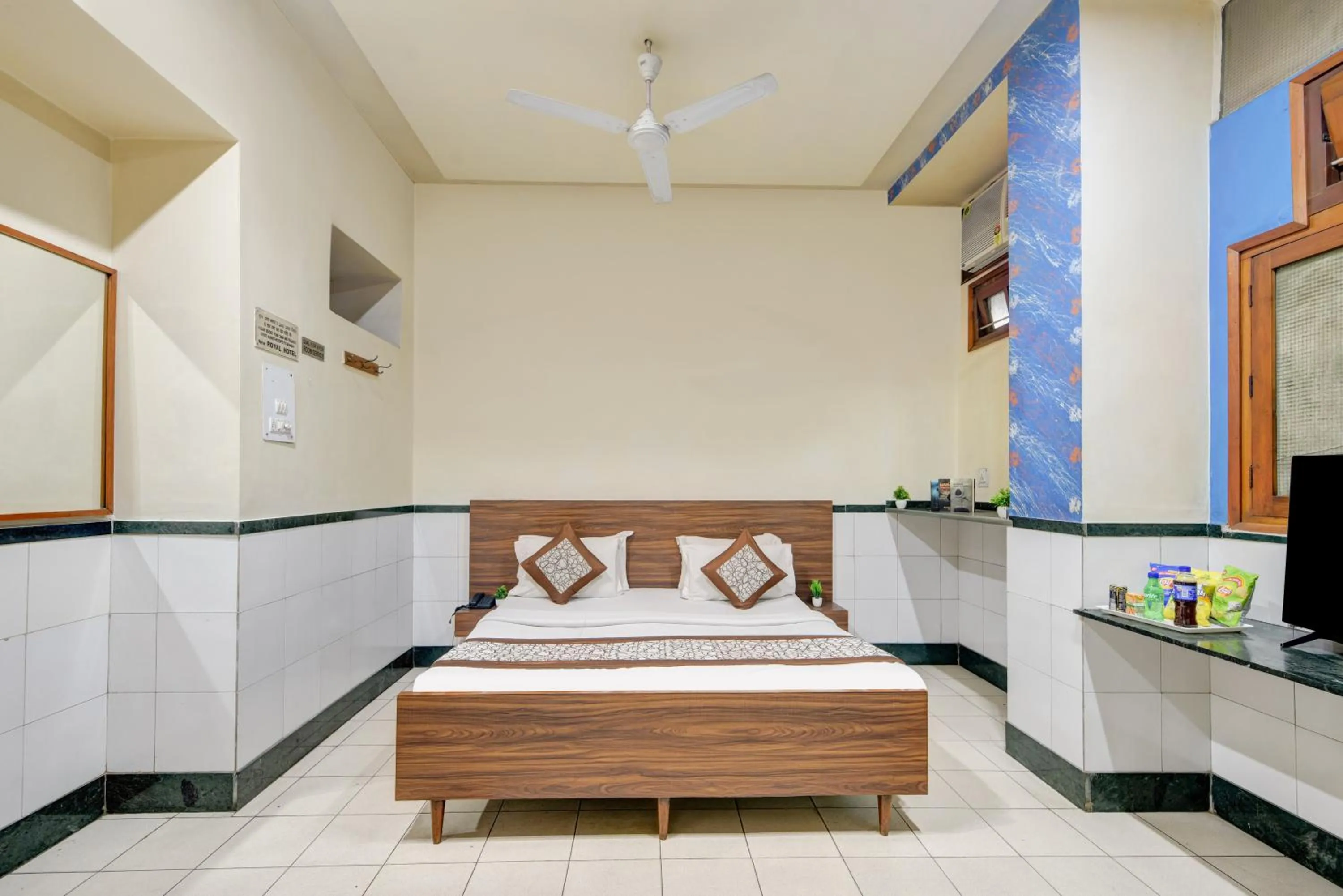 Photo of the whole room, Bed in New Royal Hotel Just Near Old Delhi Railway Station And Chandni Chowk