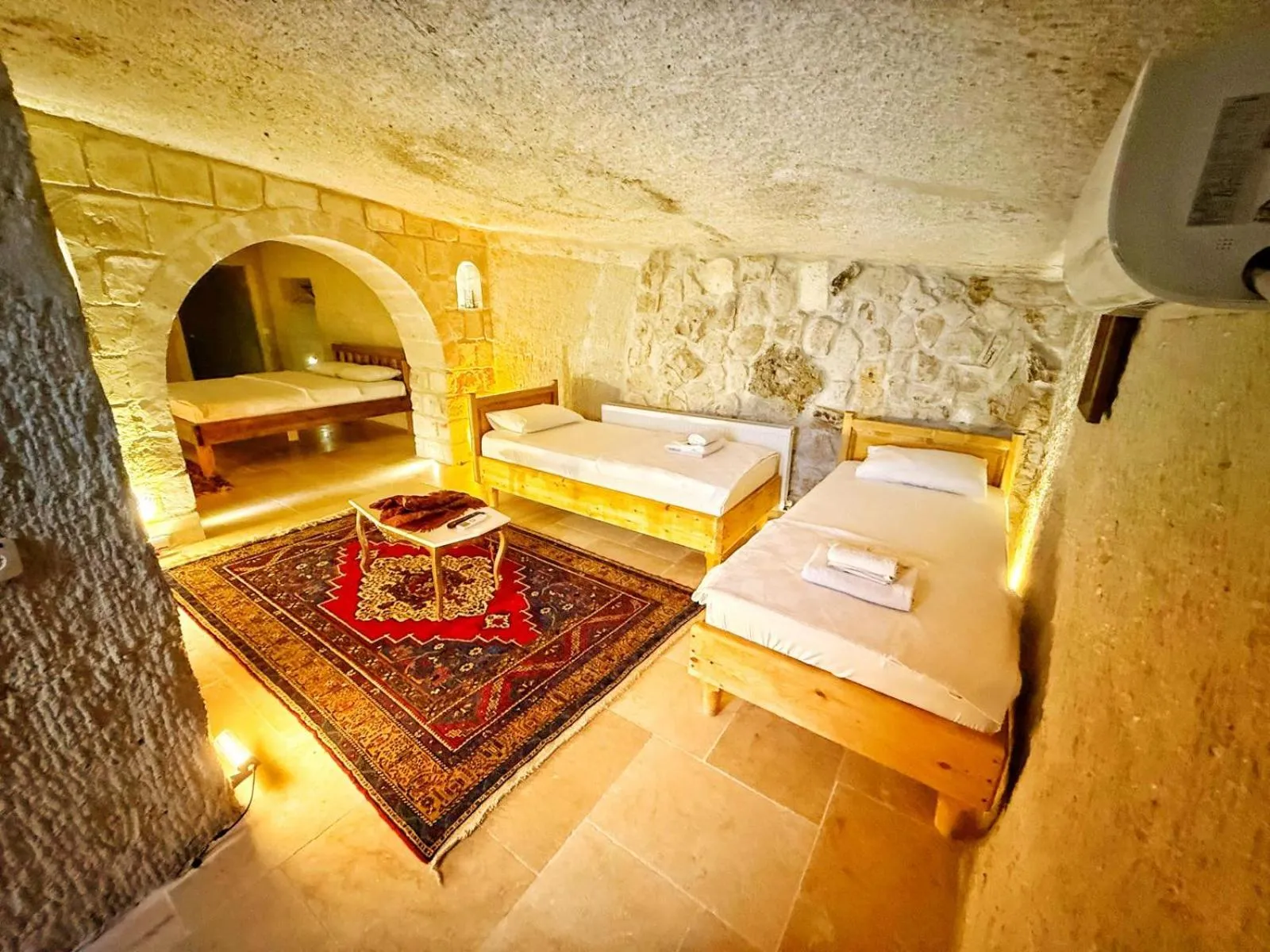 Bedroom in My Cave Suites