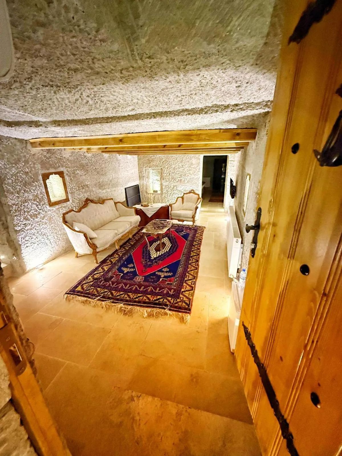 Living room in My Cave Suites