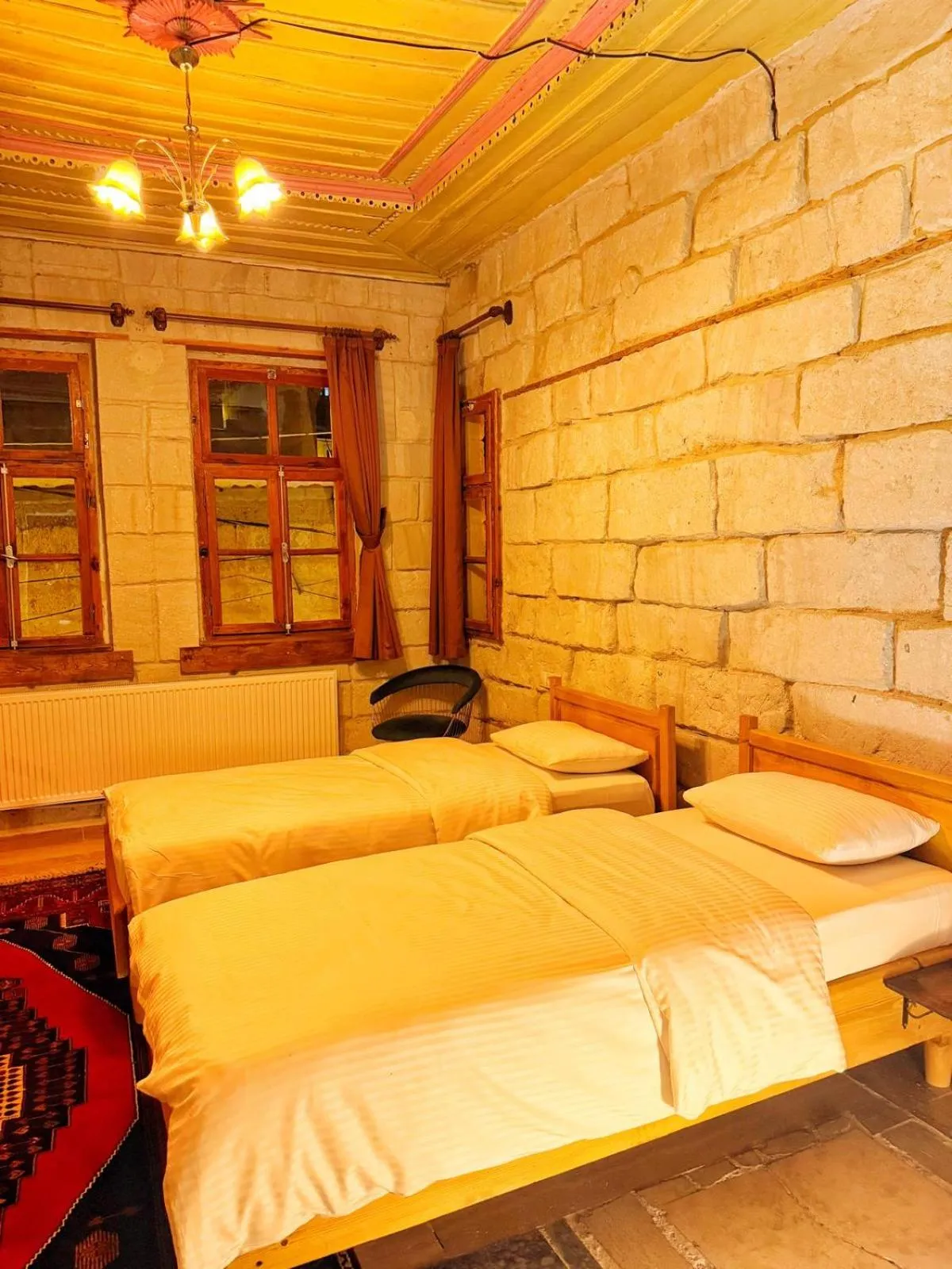 Bedroom, Bed in My Cave Suites