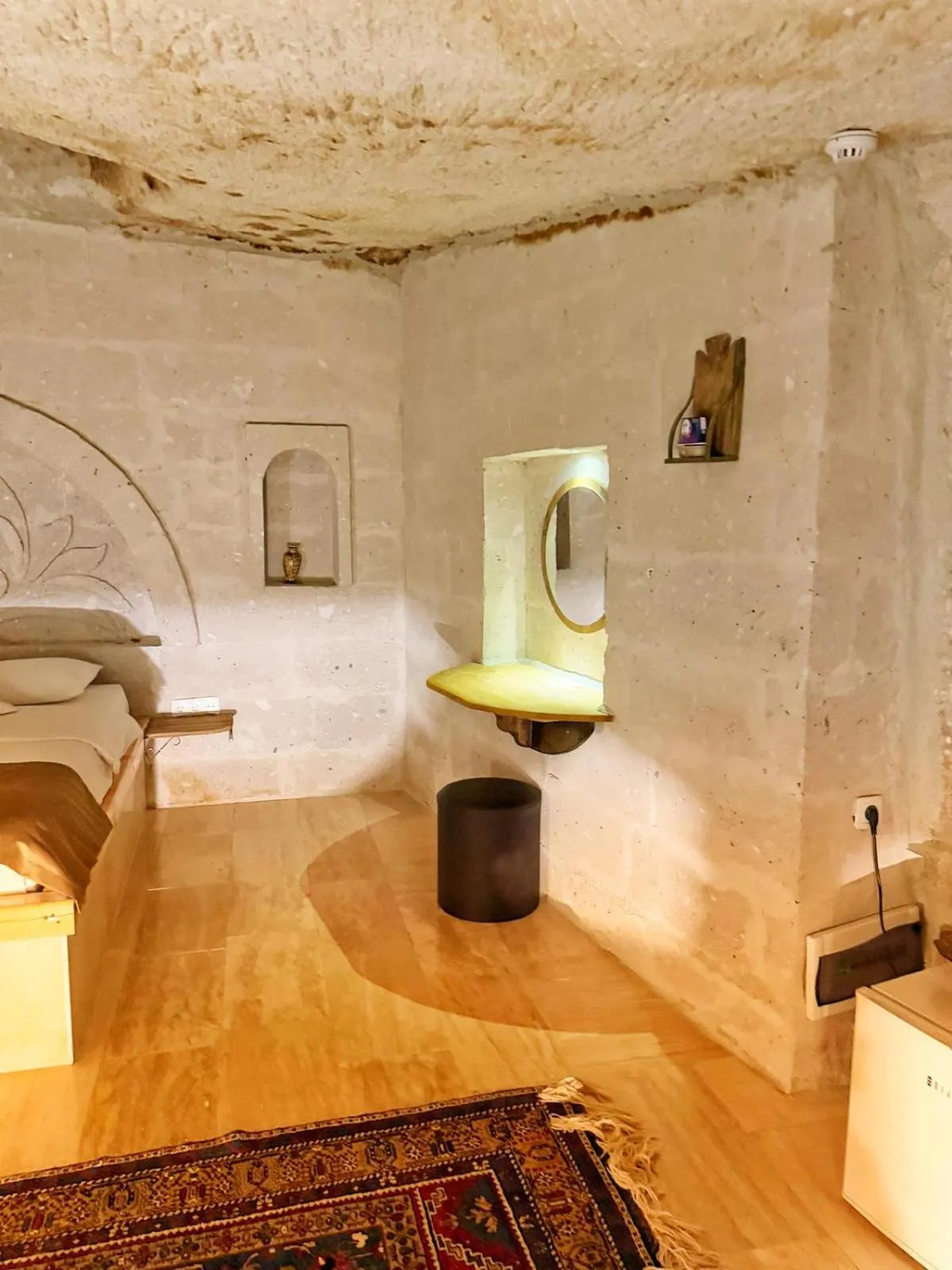 Bedroom in My Cave Suites