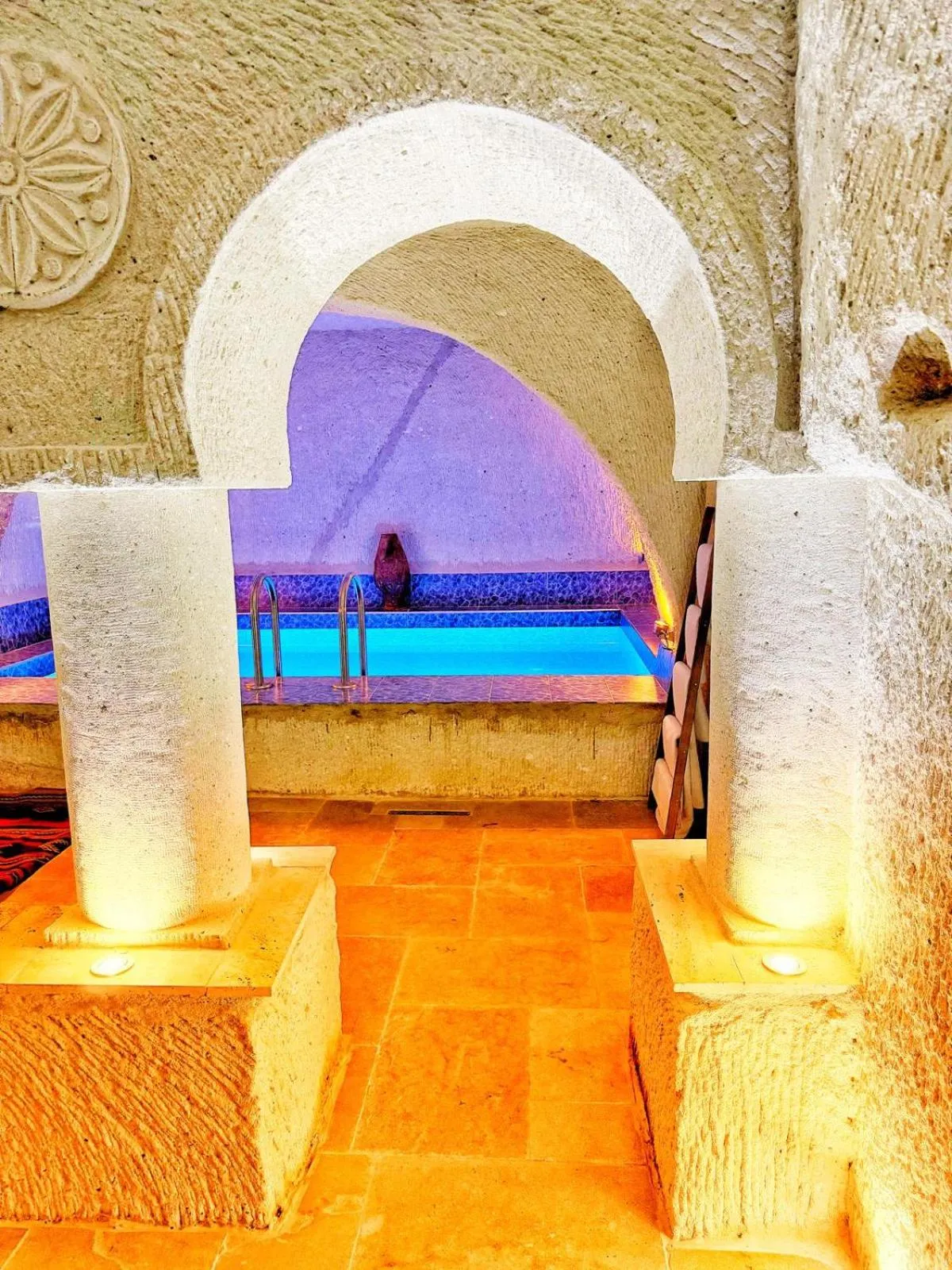 Swimming pool in My Cave Suites