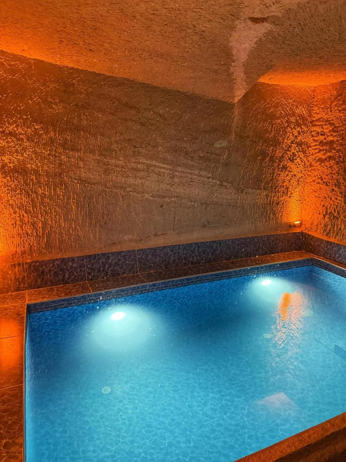 Swimming pool in My Cave Suites
