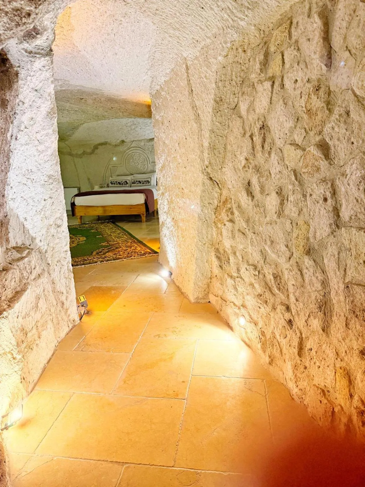 Bedroom in My Cave Suites