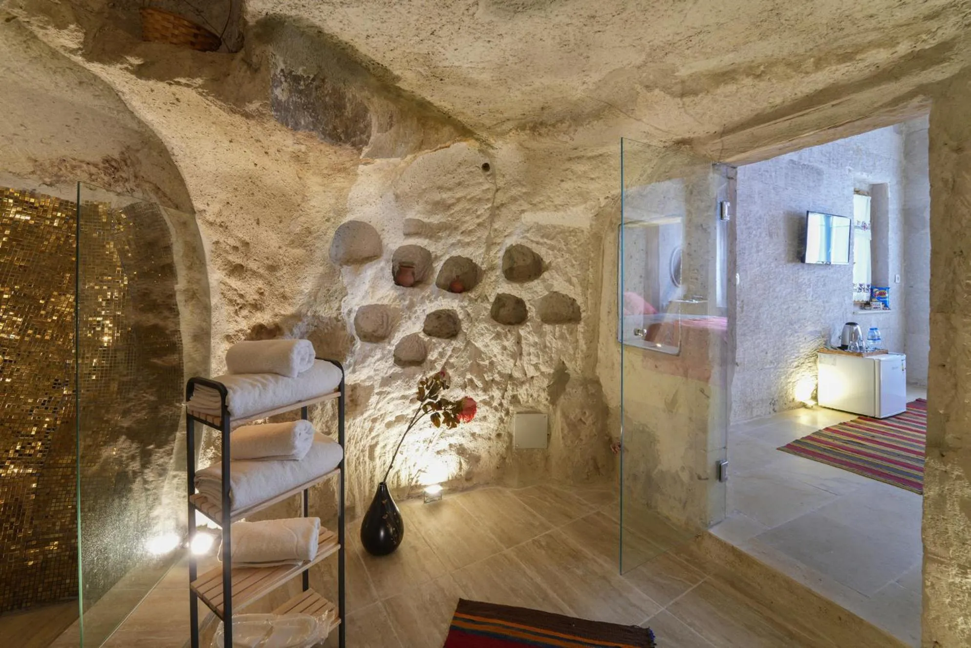 Bathroom, Bed in My Cave Suites