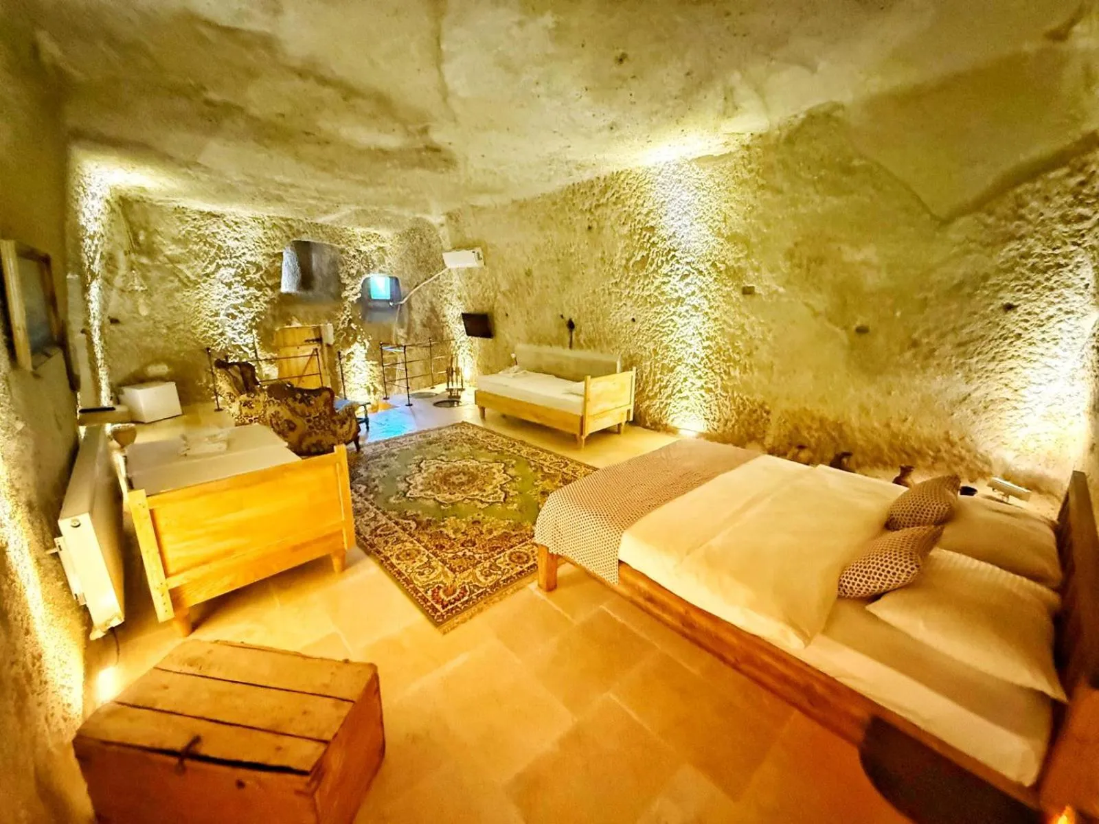 Bedroom in My Cave Suites
