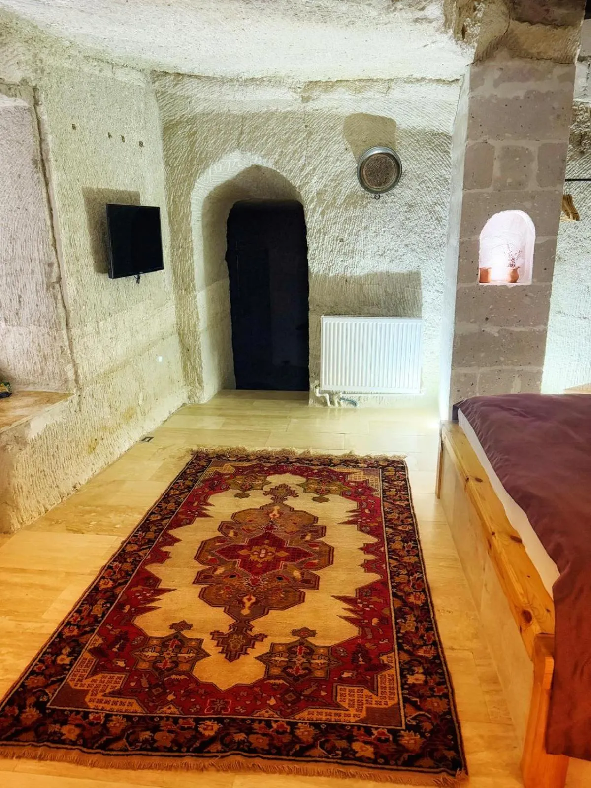 Bedroom in My Cave Suites