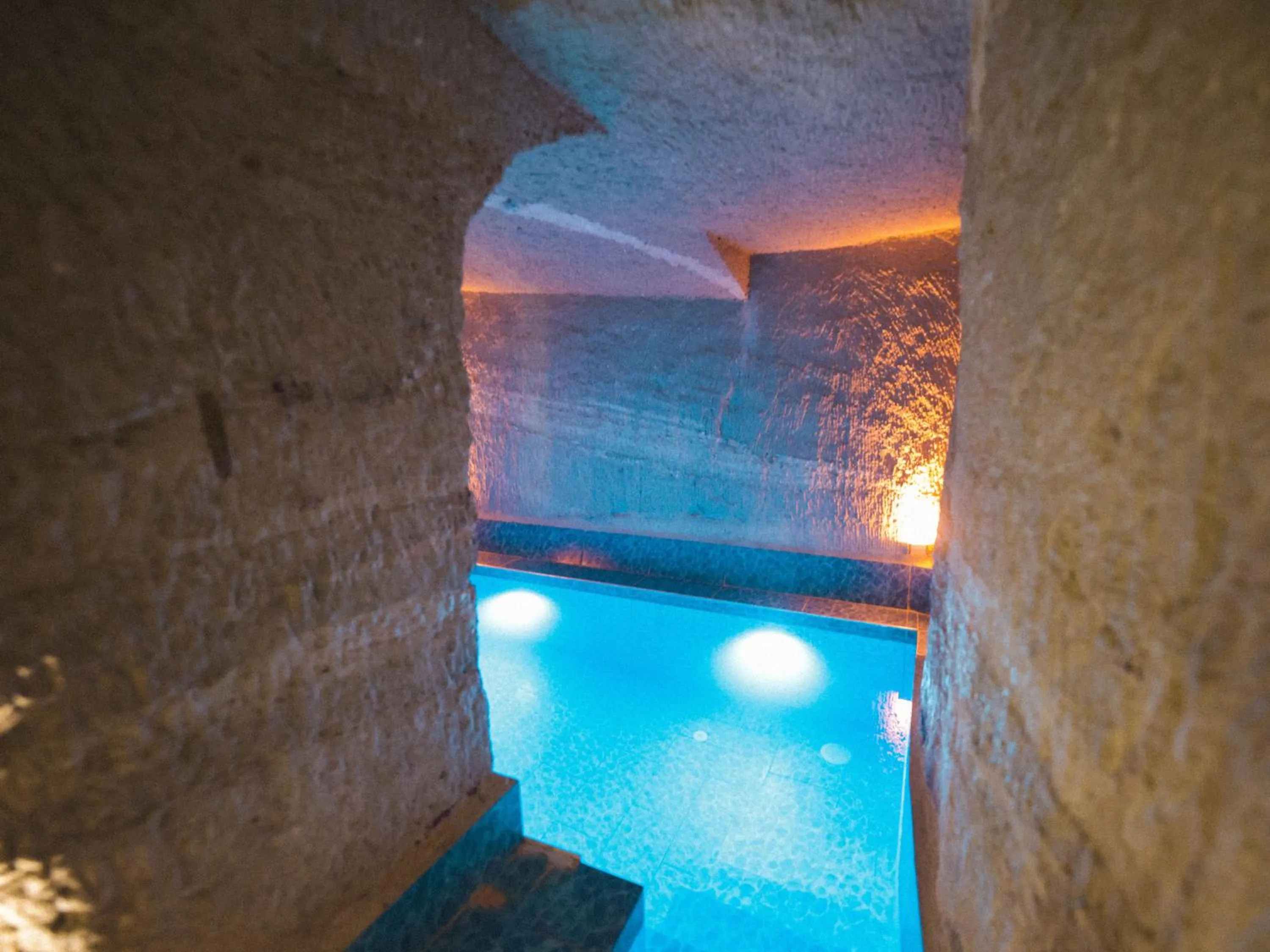 Swimming pool in My Cave Suites