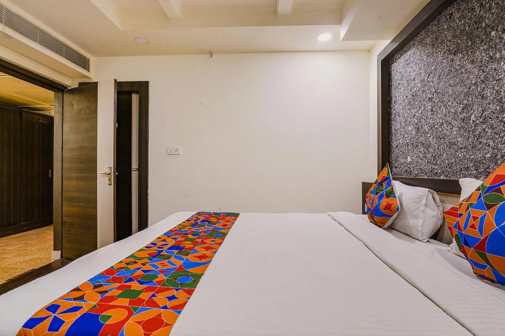 Bed in FabHotel Golden Way