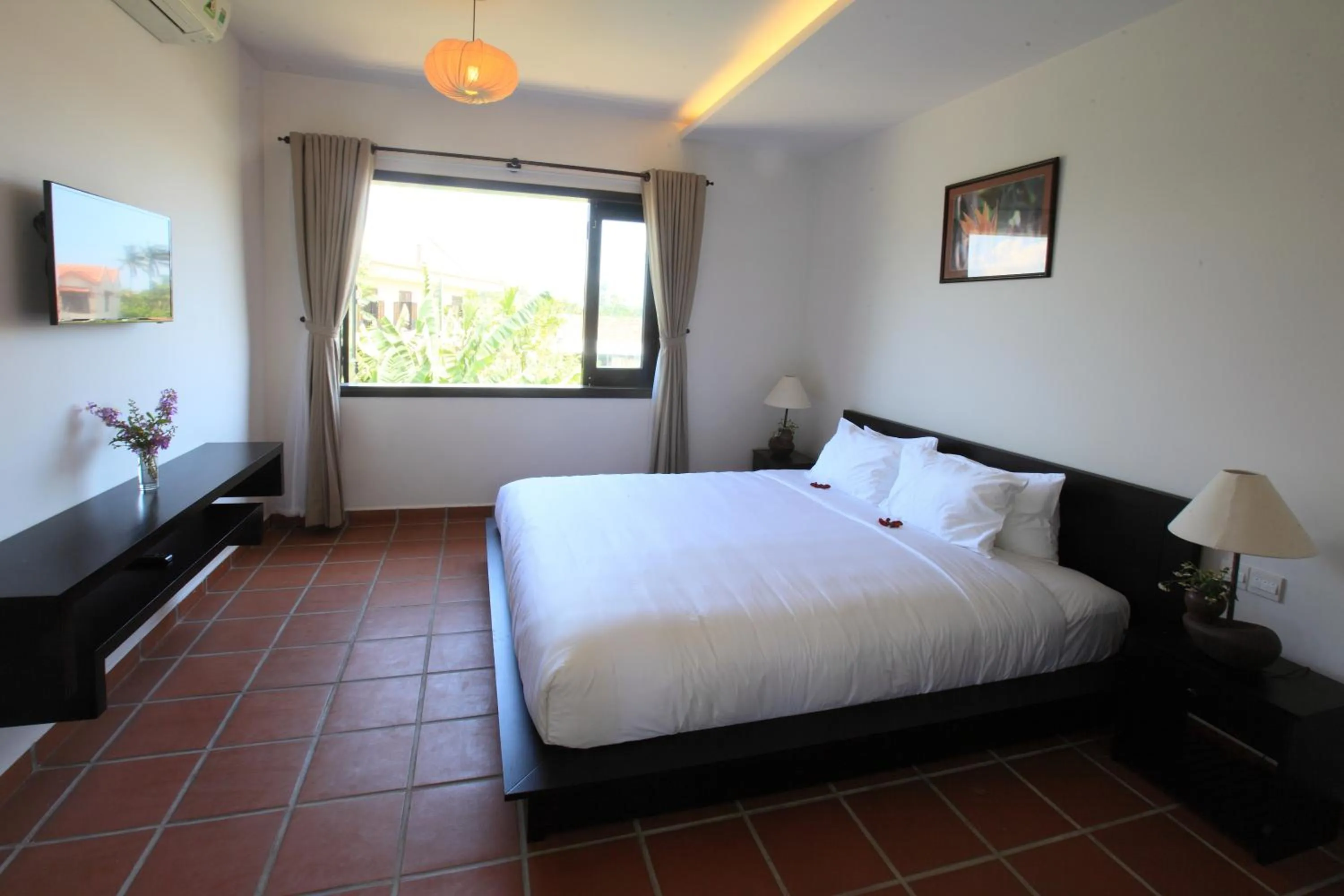 Bed in East West Villa