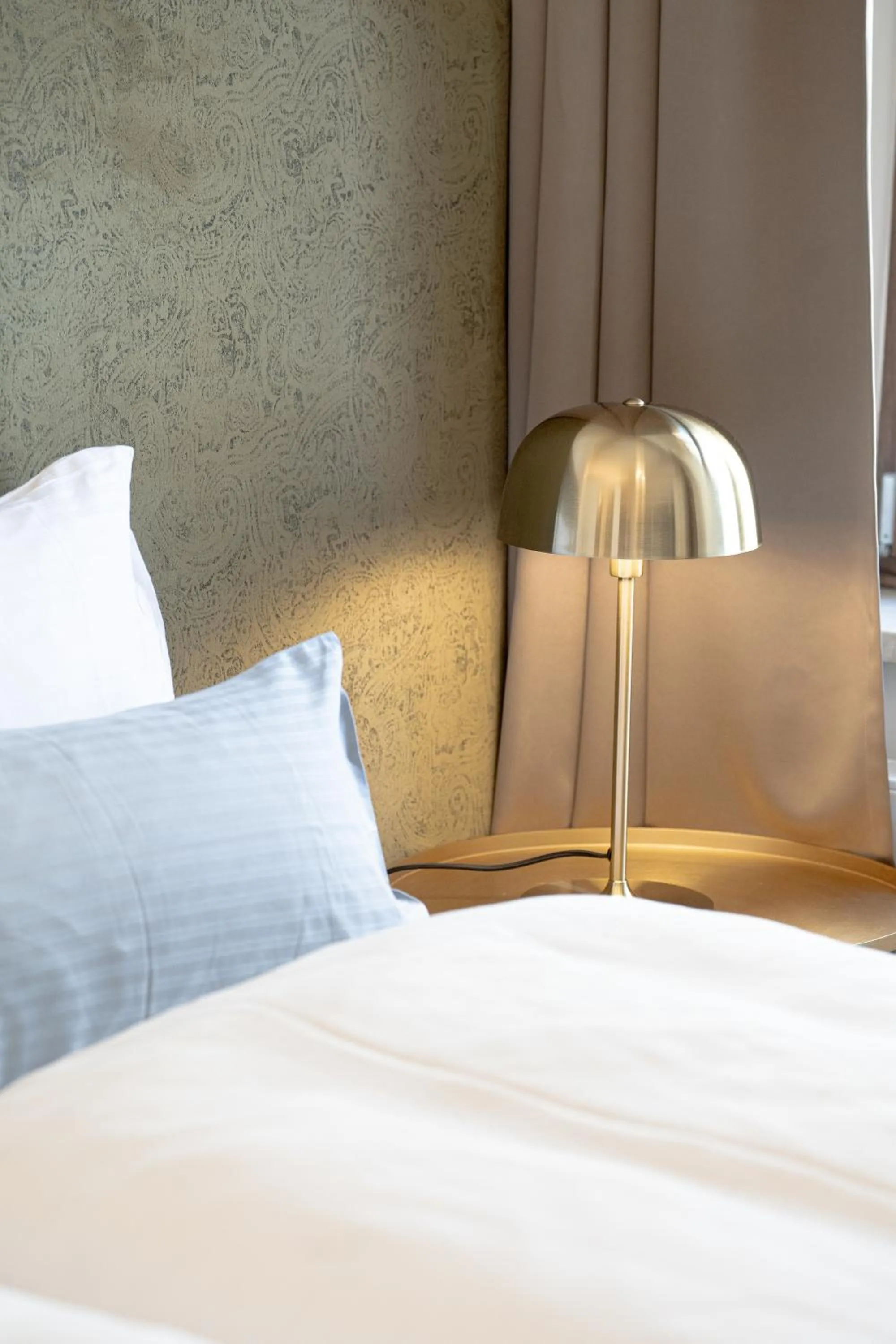 Bed in Maxim Suites by Elias Holl