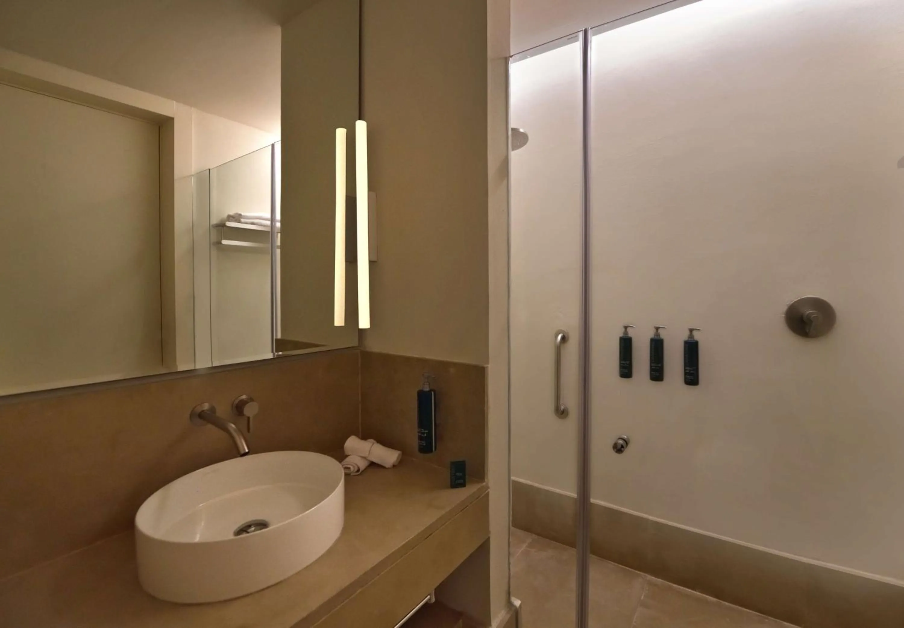 Bathroom in Doubletree By Hilton Ben Guerir Hotel & Residences