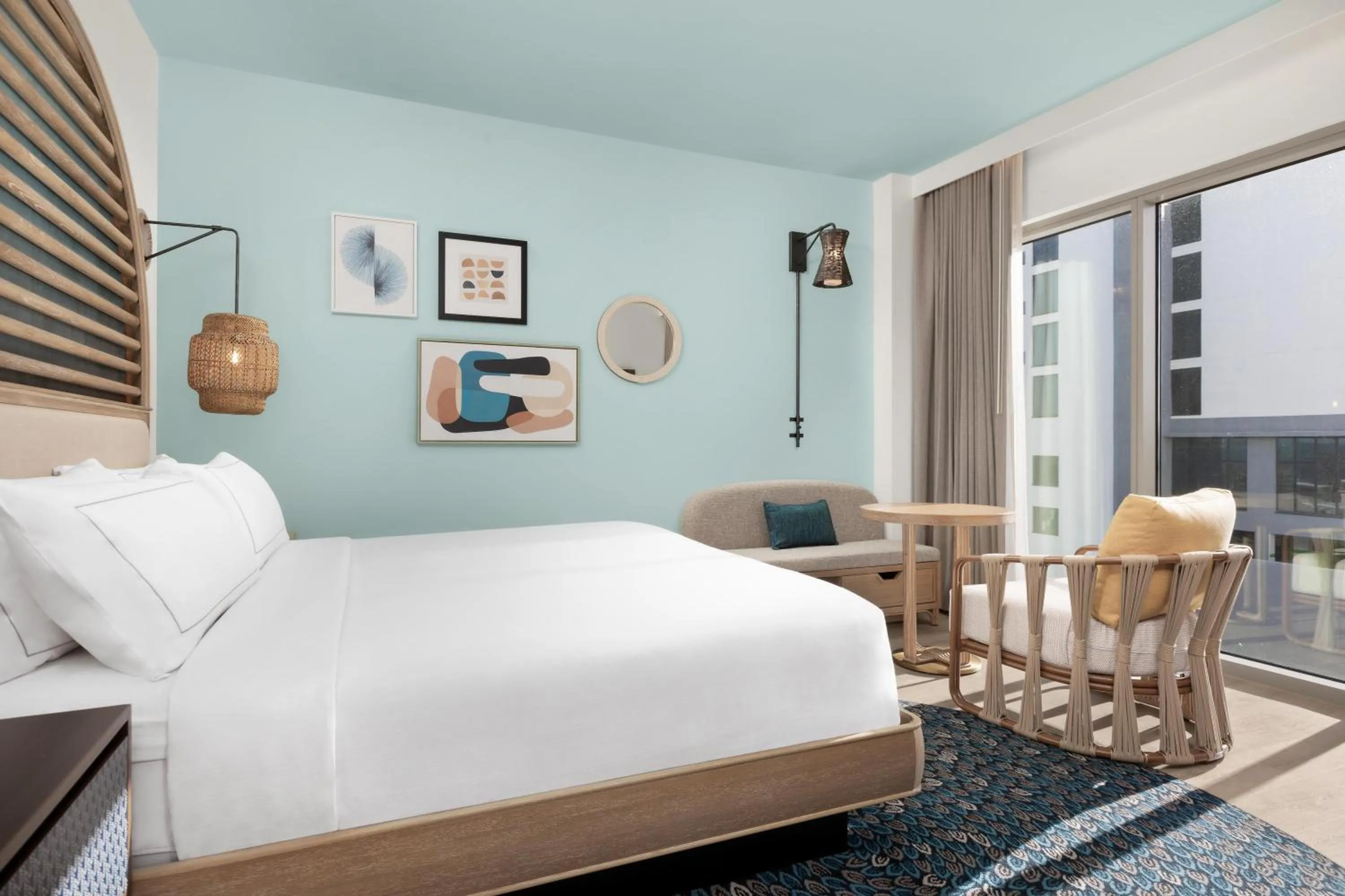 Living room, Bed in The Hiatus Clearwater Beach, Curio Collection By Hilton