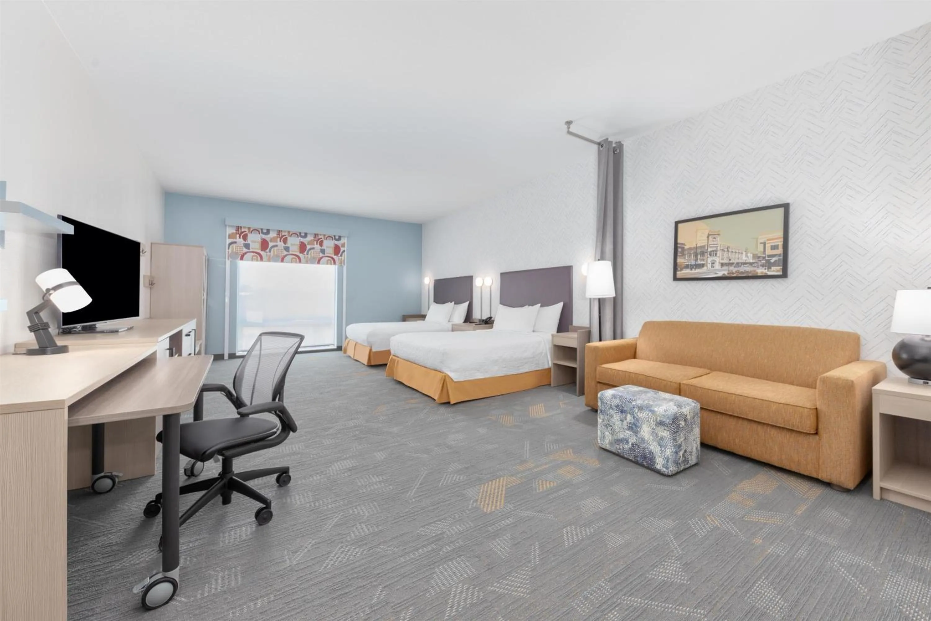 Living room, Bed in Home2 Suites By Hilton Paris