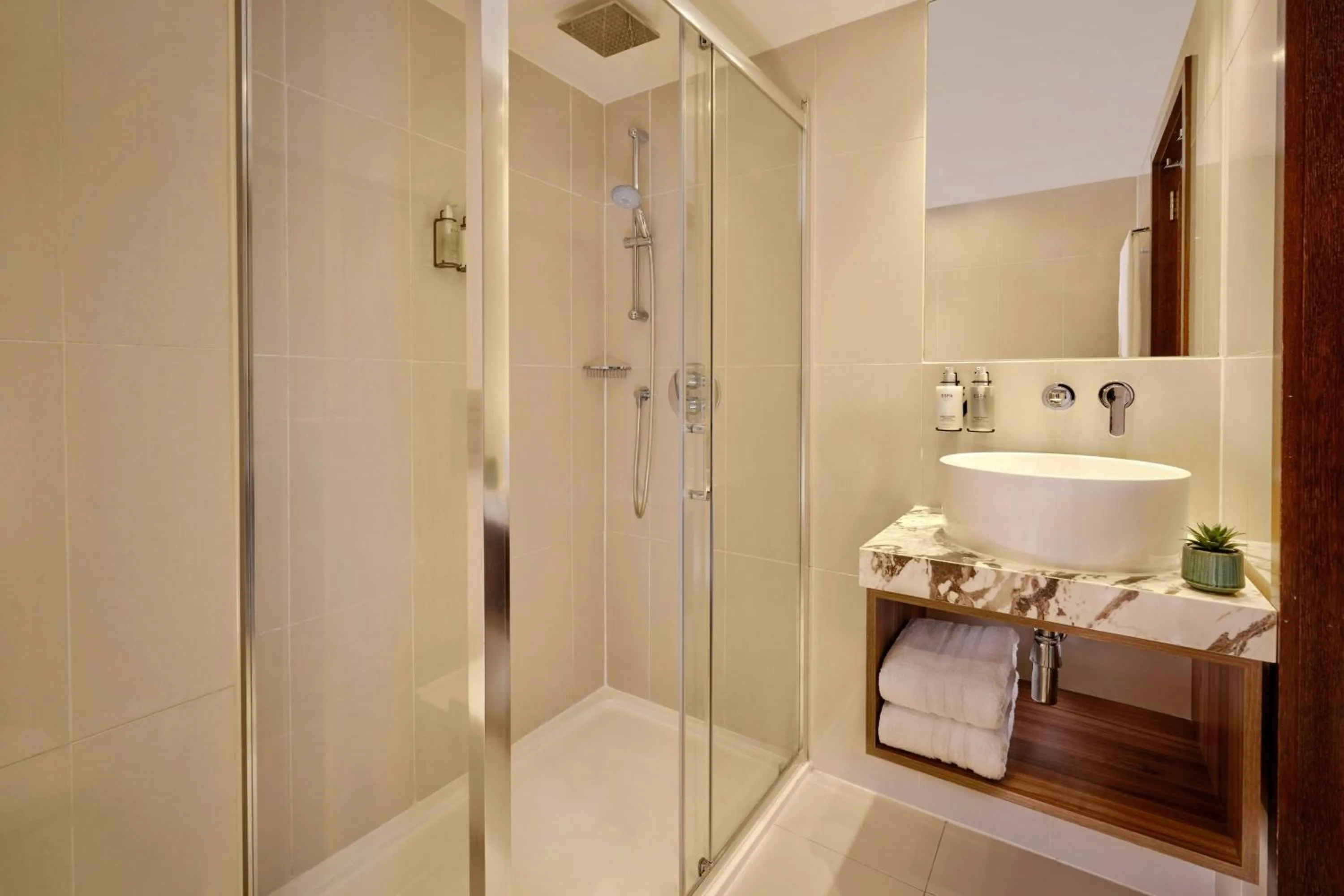 Bathroom in Park Grand London Kensington