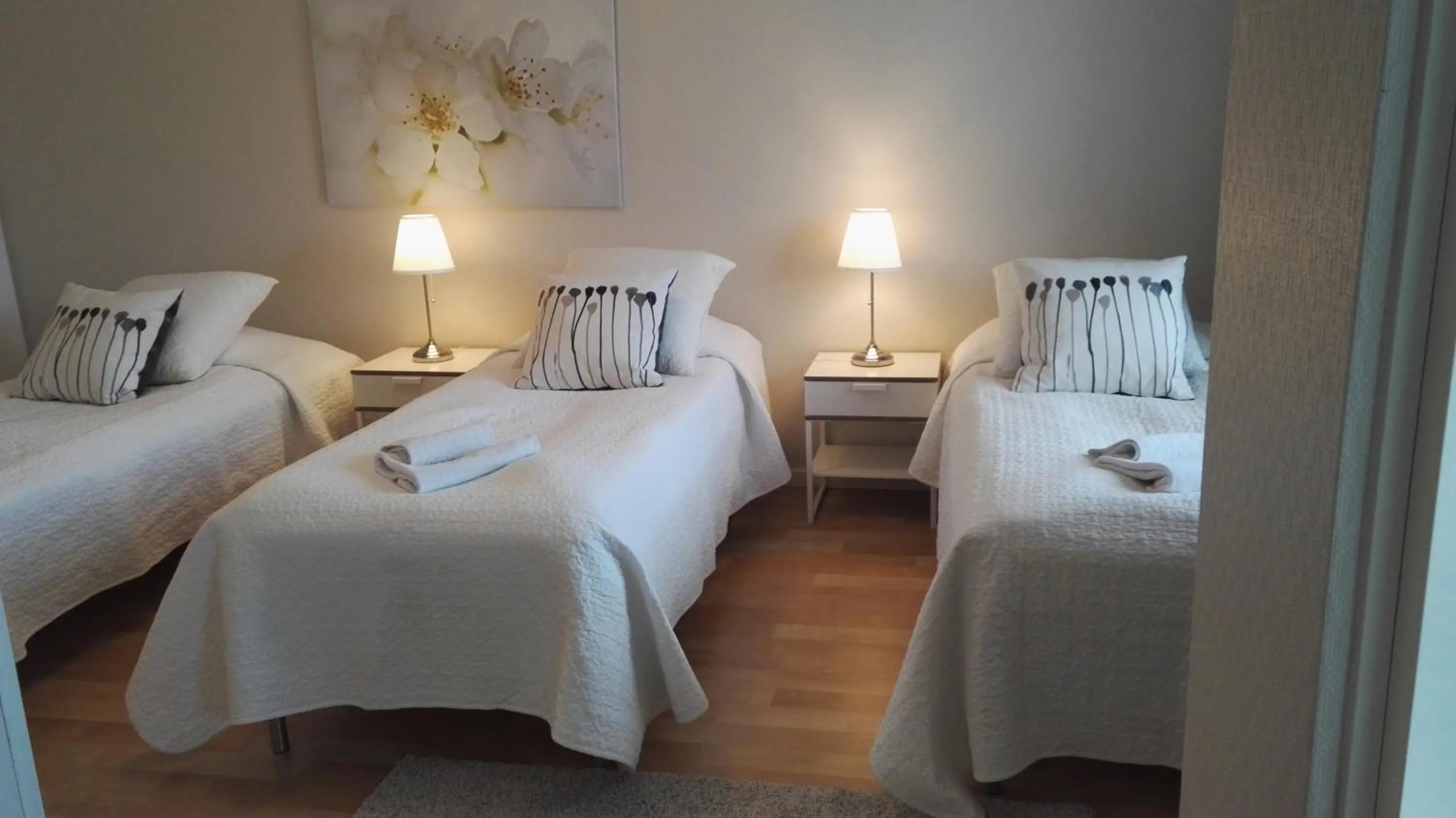 Bed in Kotimaailma Apartments Rovaniemi