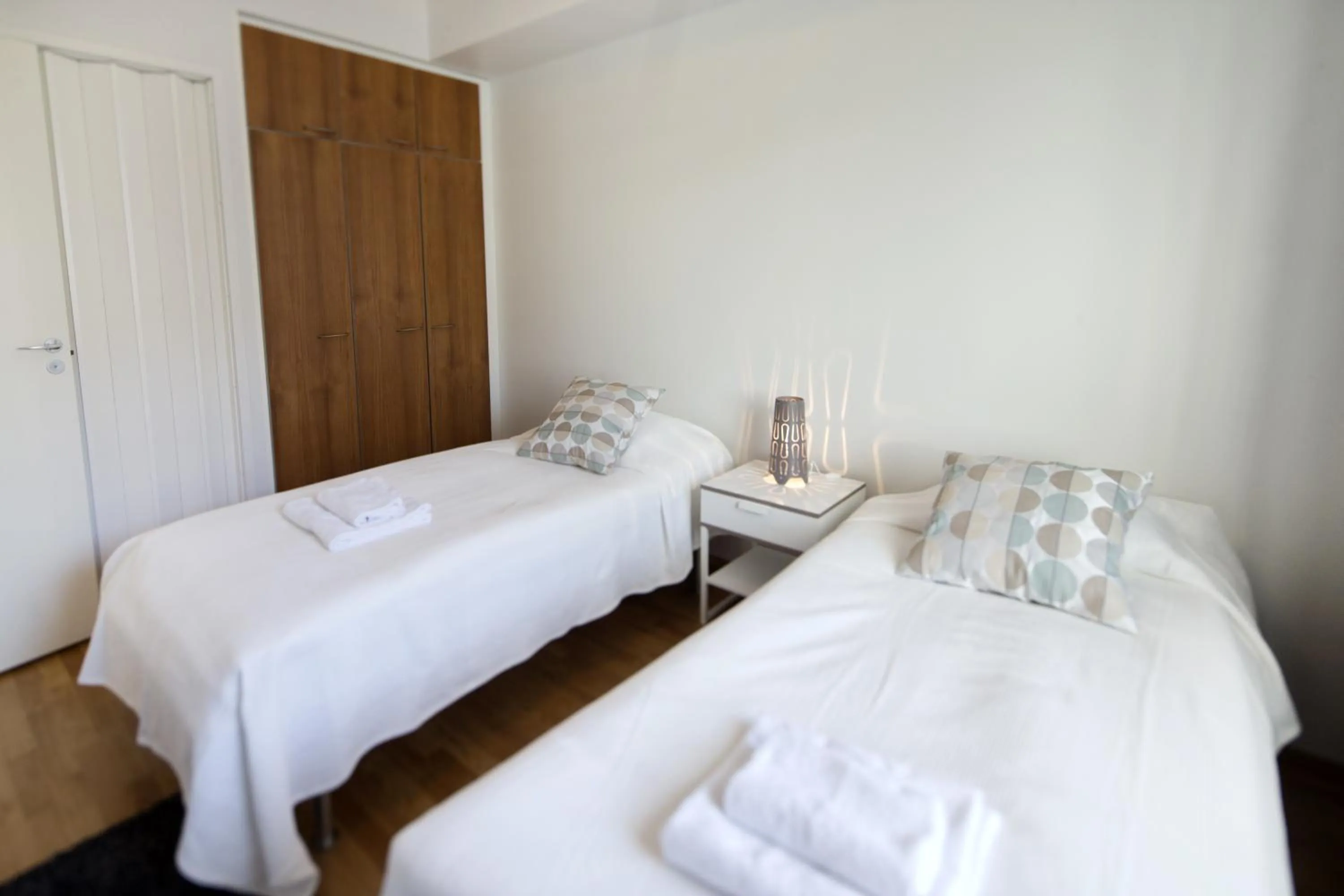 Bed in Kotimaailma Apartments Rovaniemi