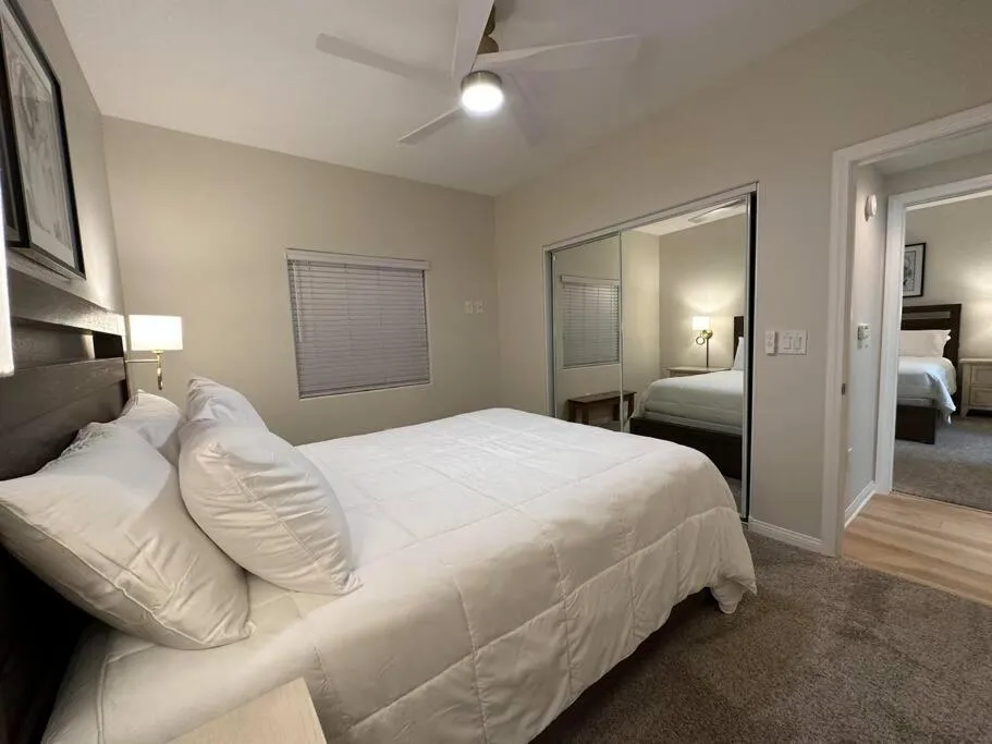 Bed in Mesquite Retreat 2 Bd Condo by Cool Properties LLC