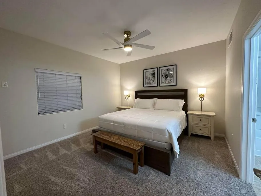 Bed in Mesquite Retreat 2 Bd Condo by Cool Properties LLC