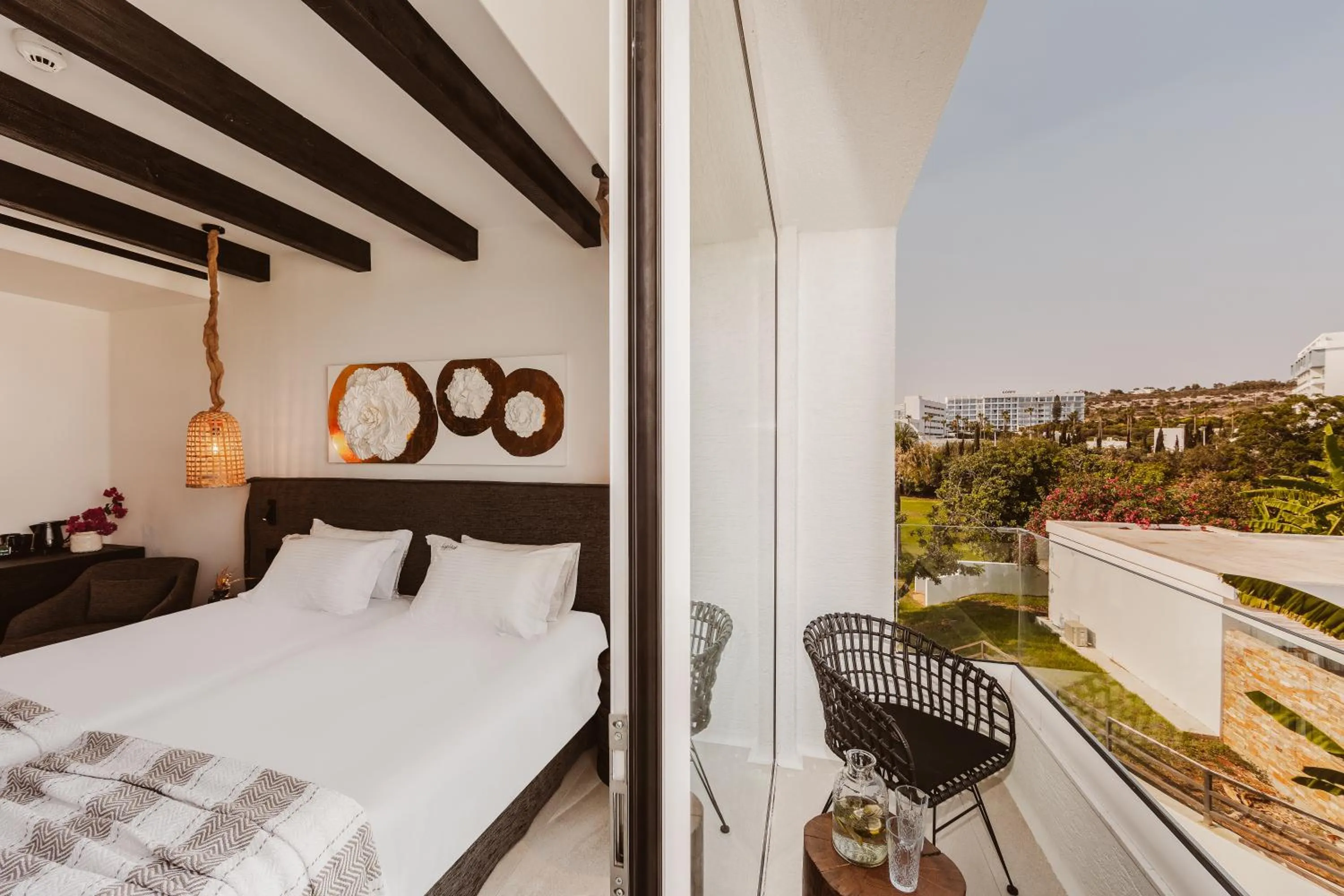 Bed in Kaliva Suites - Adults Only