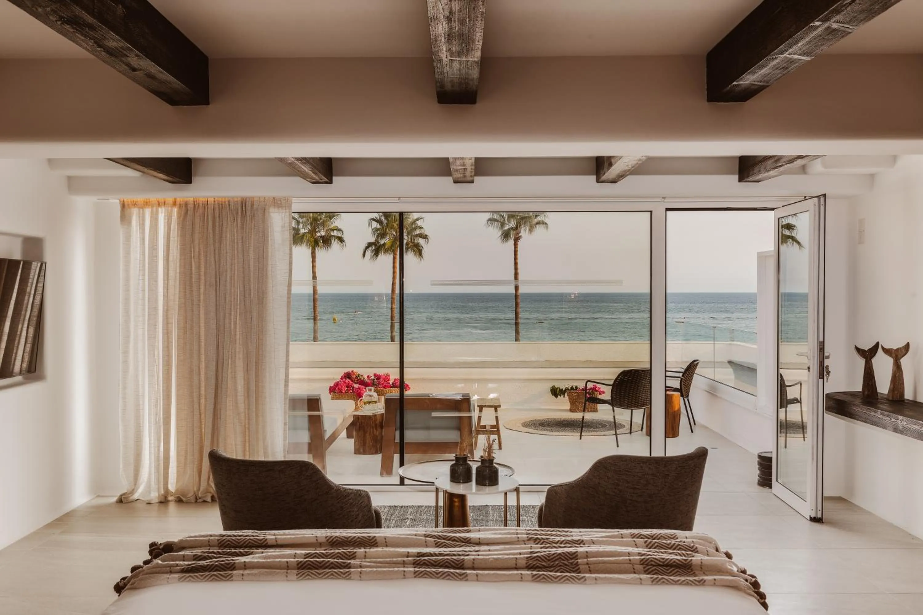 Bed in Kaliva Suites - Adults Only