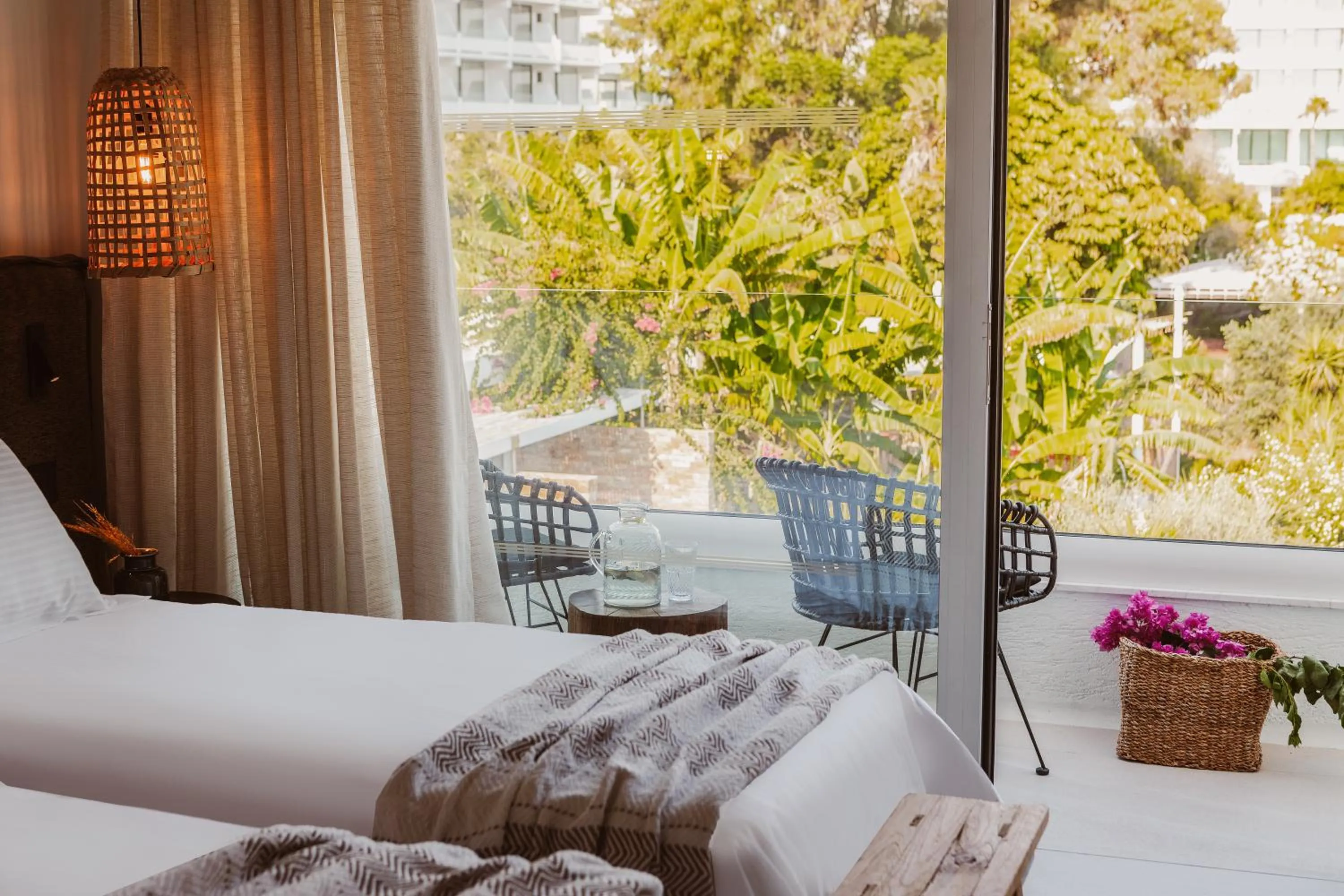 Bed in Kaliva Suites - Adults Only